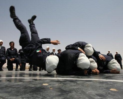 Jordanian policewoman training in hand to hand combat at the Al Muwaqqar centre