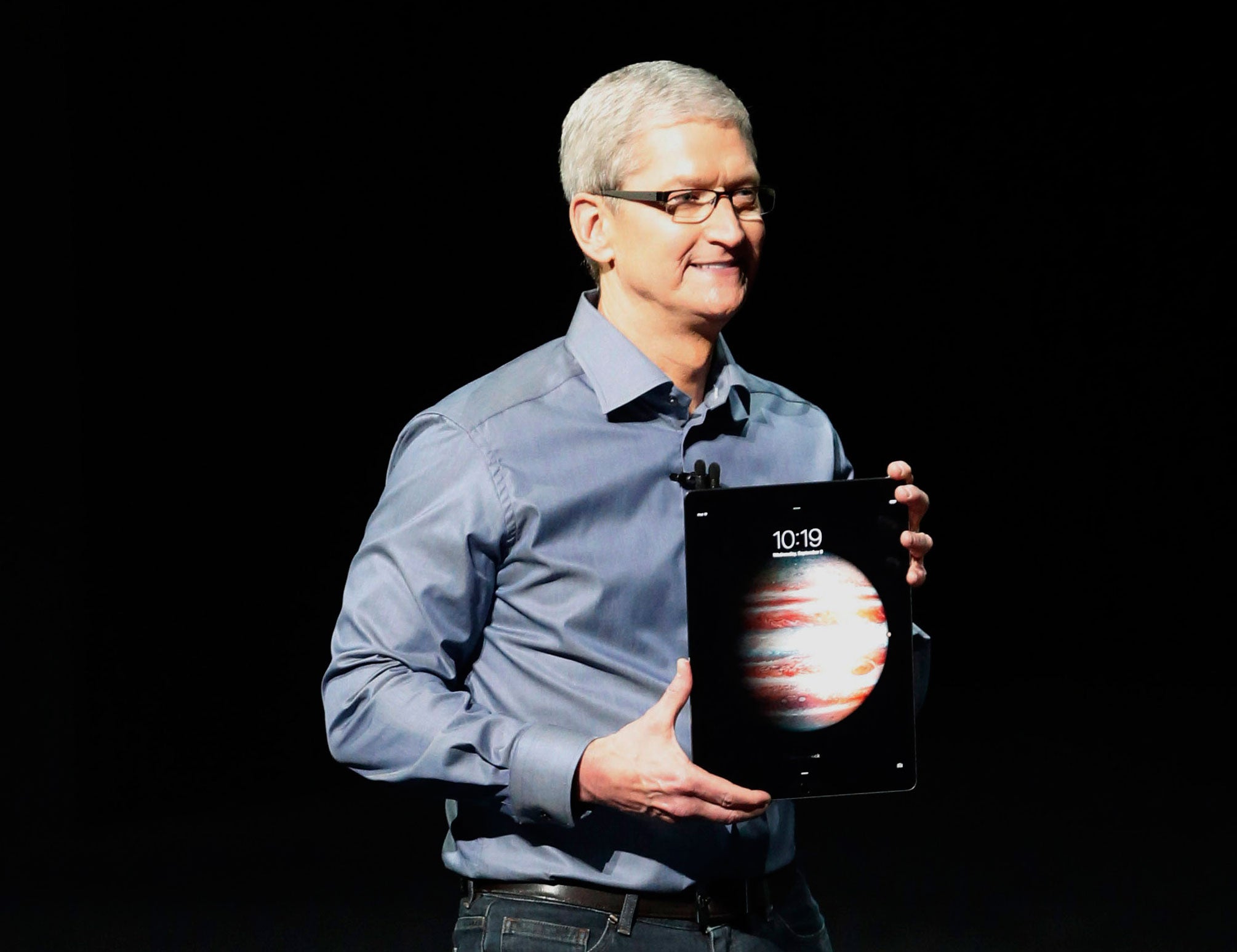 Apple CEO Tim Cook holds the hefty iPad Pro at its unveiling in September 2015