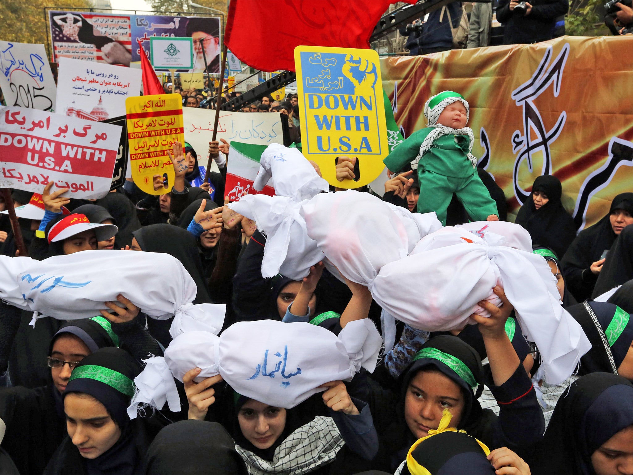 &#13;
Protesters outside the former US embassy in Tehran last week mark the anniversary of the 1979 hostage crisis (Getty)&#13;