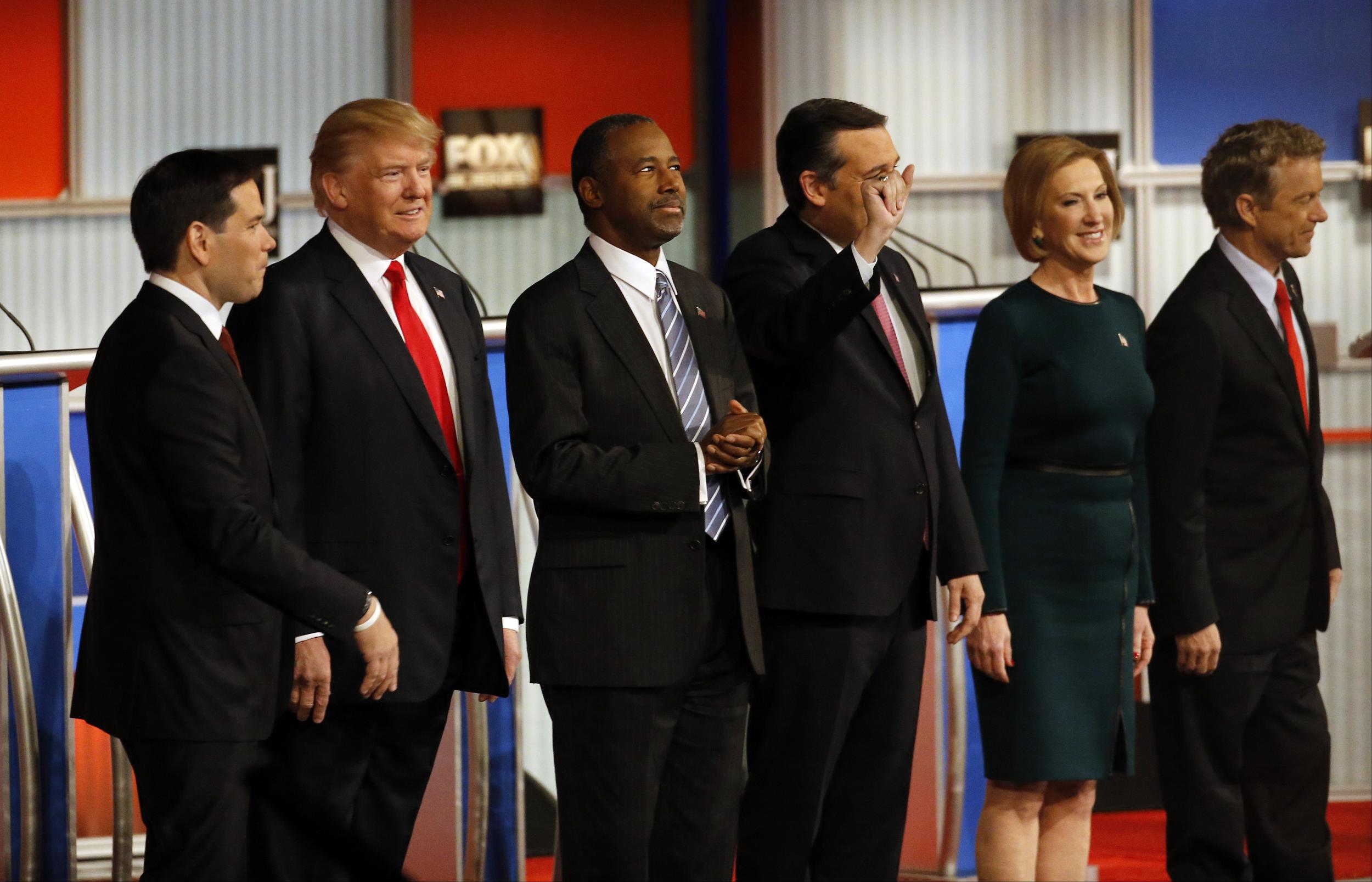 The leading candidates take the stage in Milwaukee. Morry Gash/AP