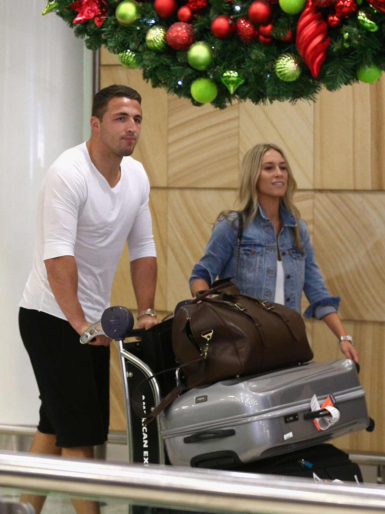 &#13;
Burgess arrives in Sydney alongside his fiancée&#13;