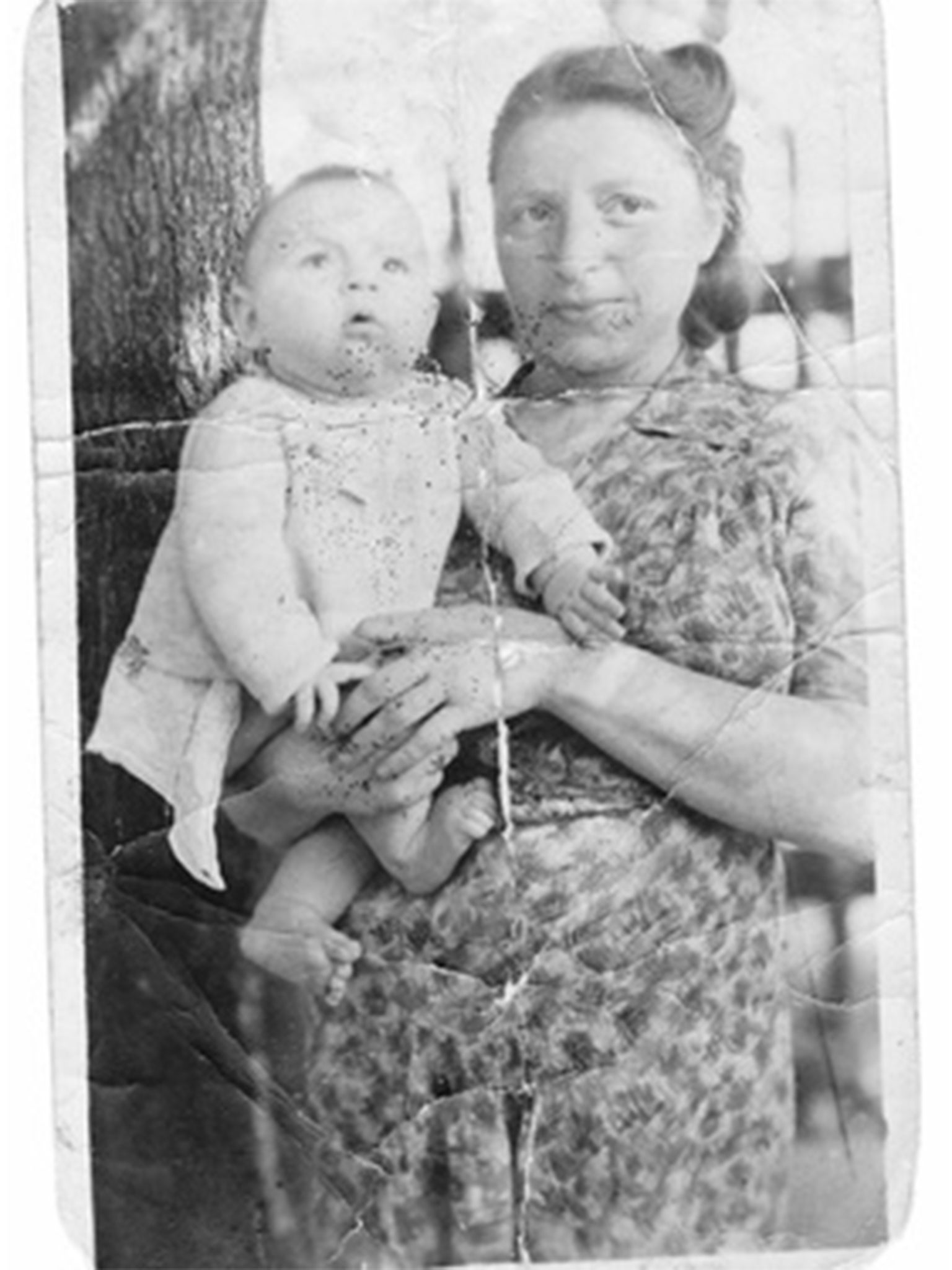 Fela Herling and her infant son, Simcha, Landsberg D.P. Camp, Germany, c. 1945.