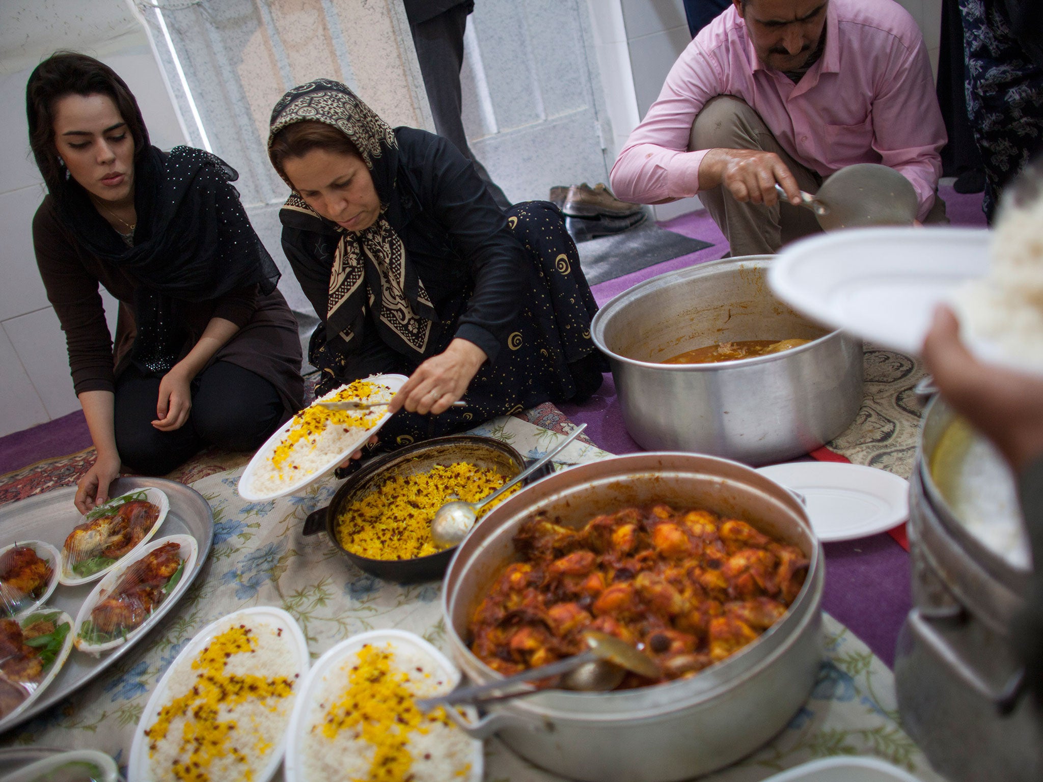 Iranians prepare food