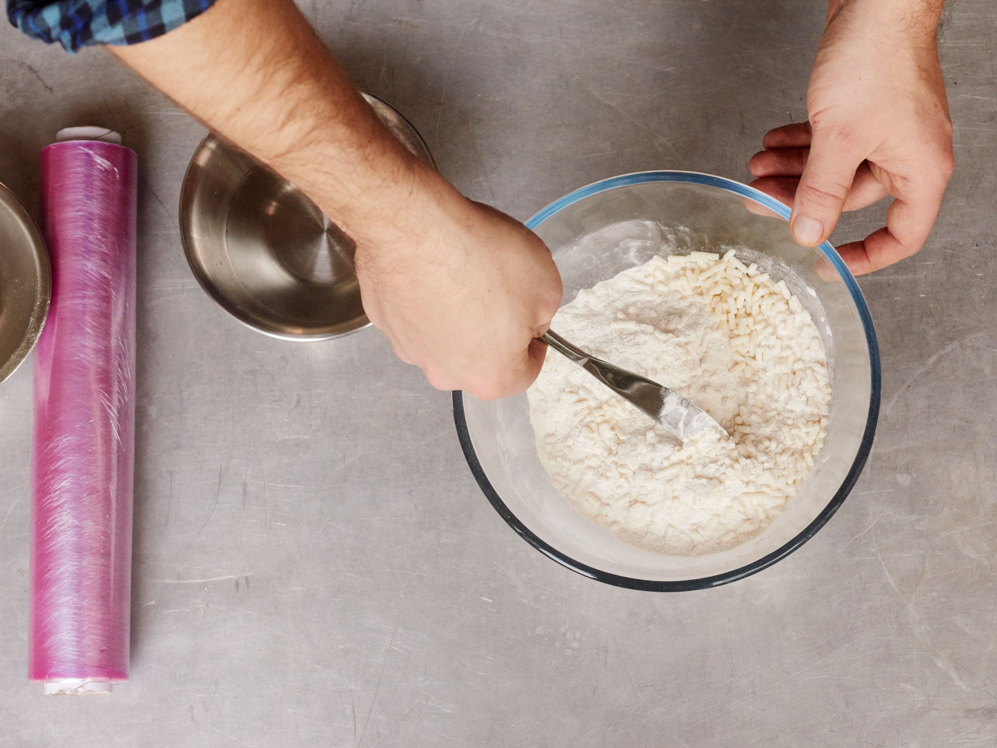 Make the pastry lid for the wildfowl pie by mixing the flour, suet and a pinch of salt in a bowl with a knife