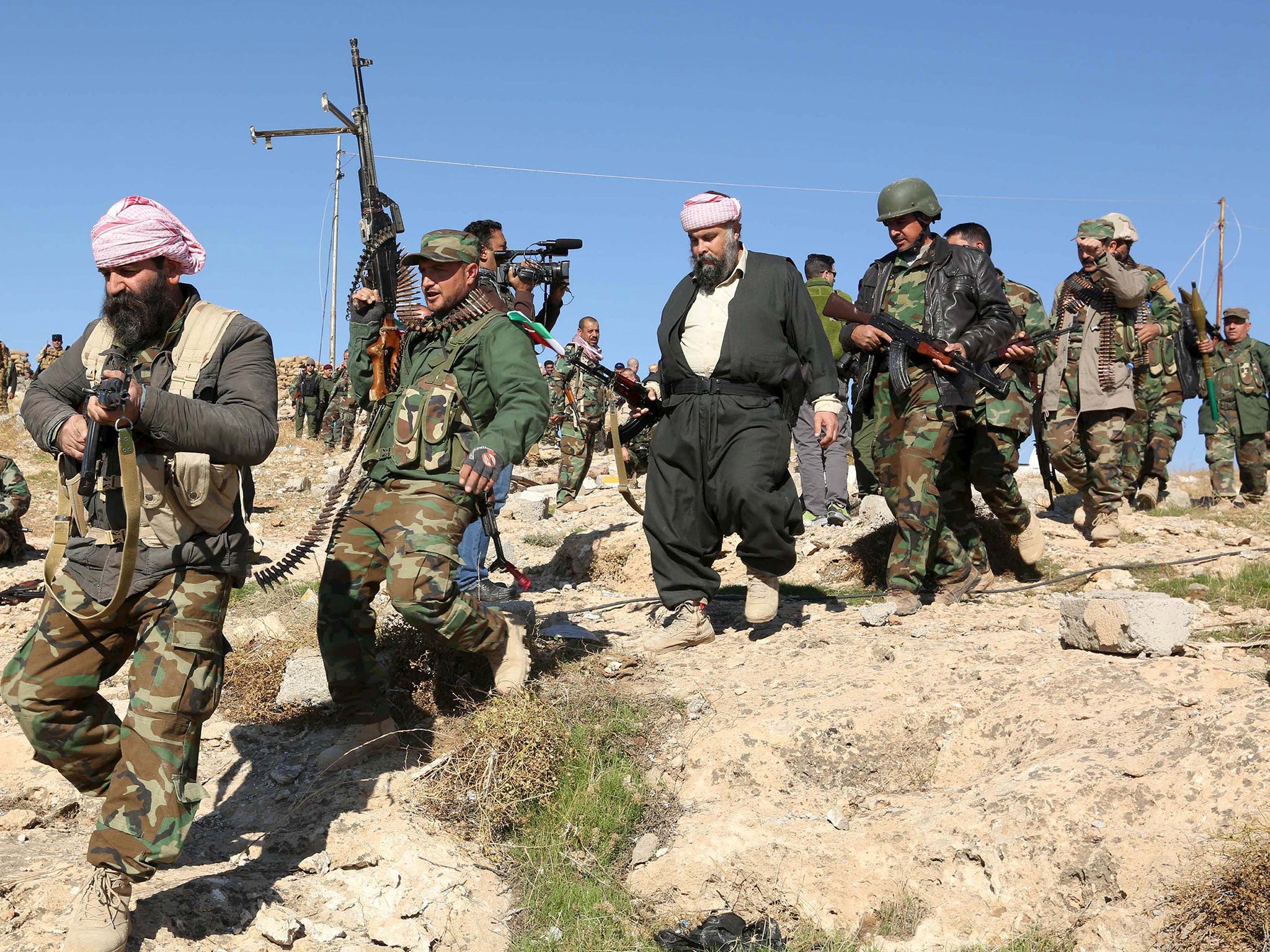 Kurdish peshmerga forces secured several strategic facilities in the northern Iraqi town of Sinjar on Friday