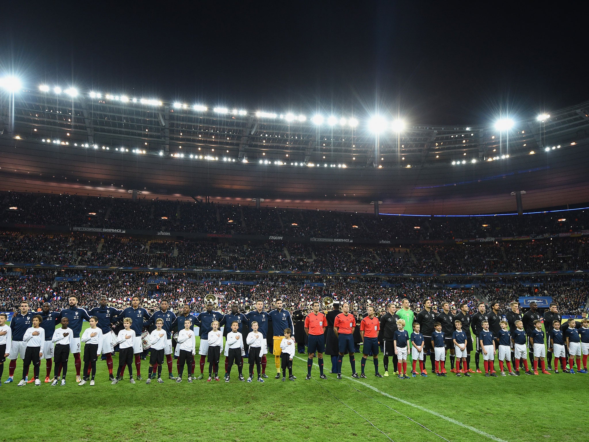 France and Germany players line up in the Stade de France before kick-off