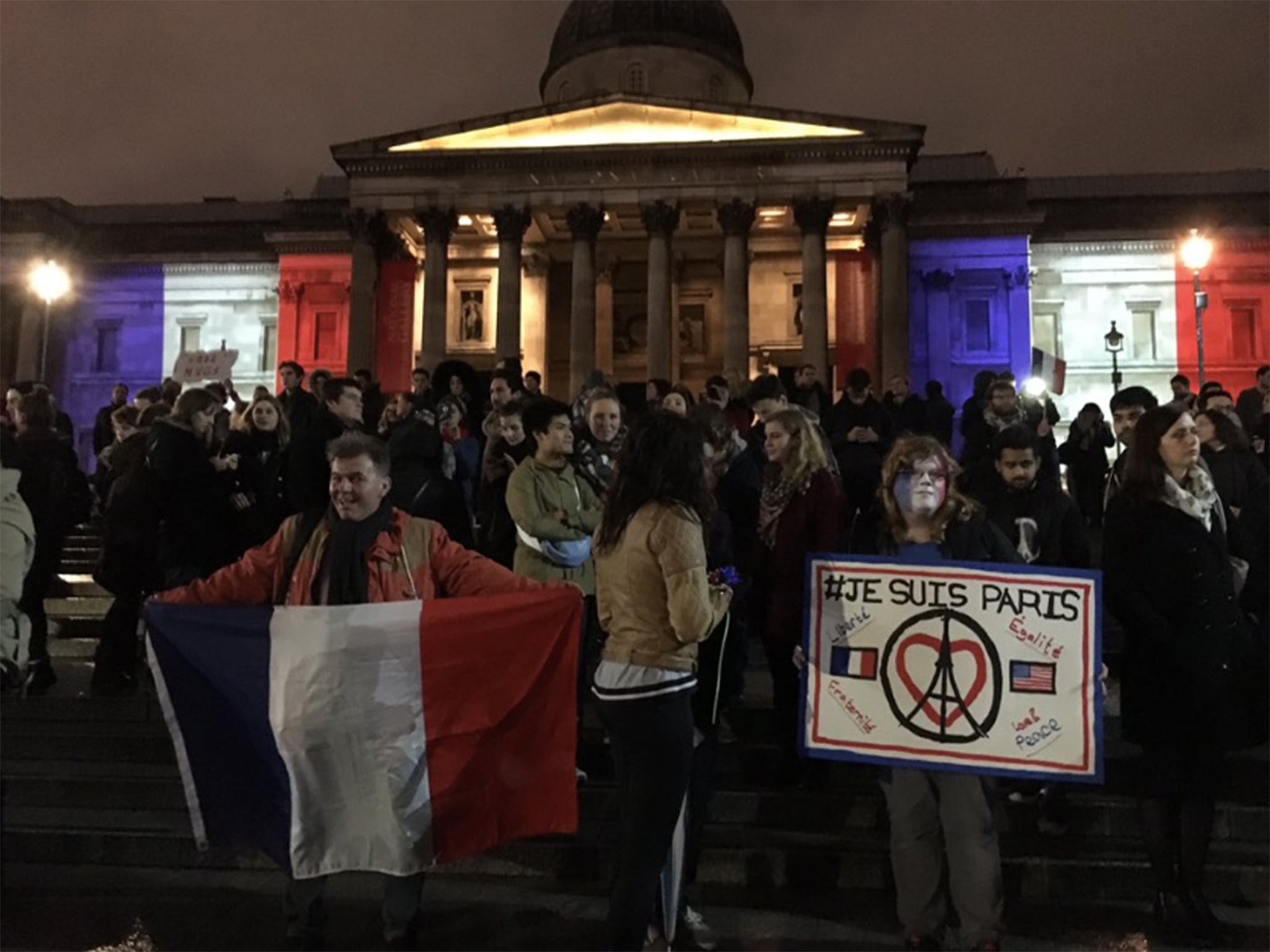 The crowd occasionally they broke into songs, including the Marseillaise and Champs Elysee