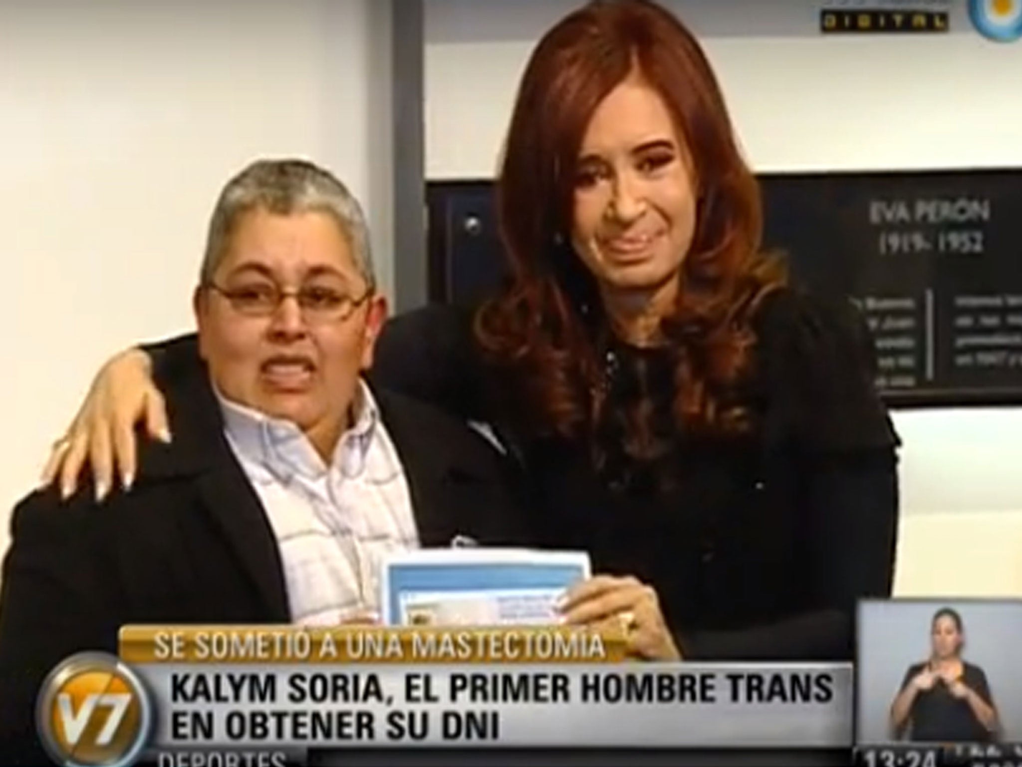 Kalym Soria with President Fernandez receiving his new ID card in 2012