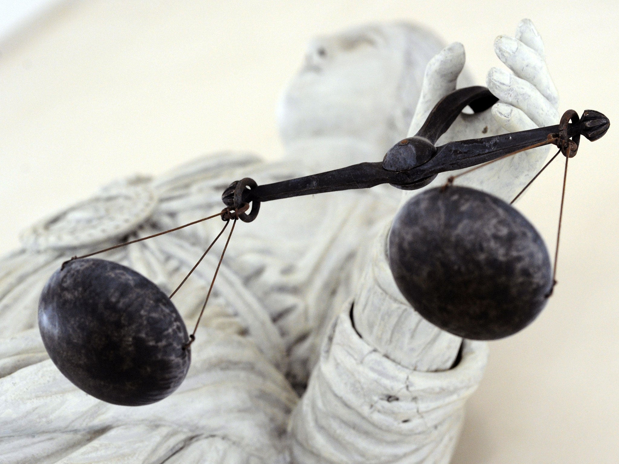 A marble statue representing Themis, the Goddess of Justice