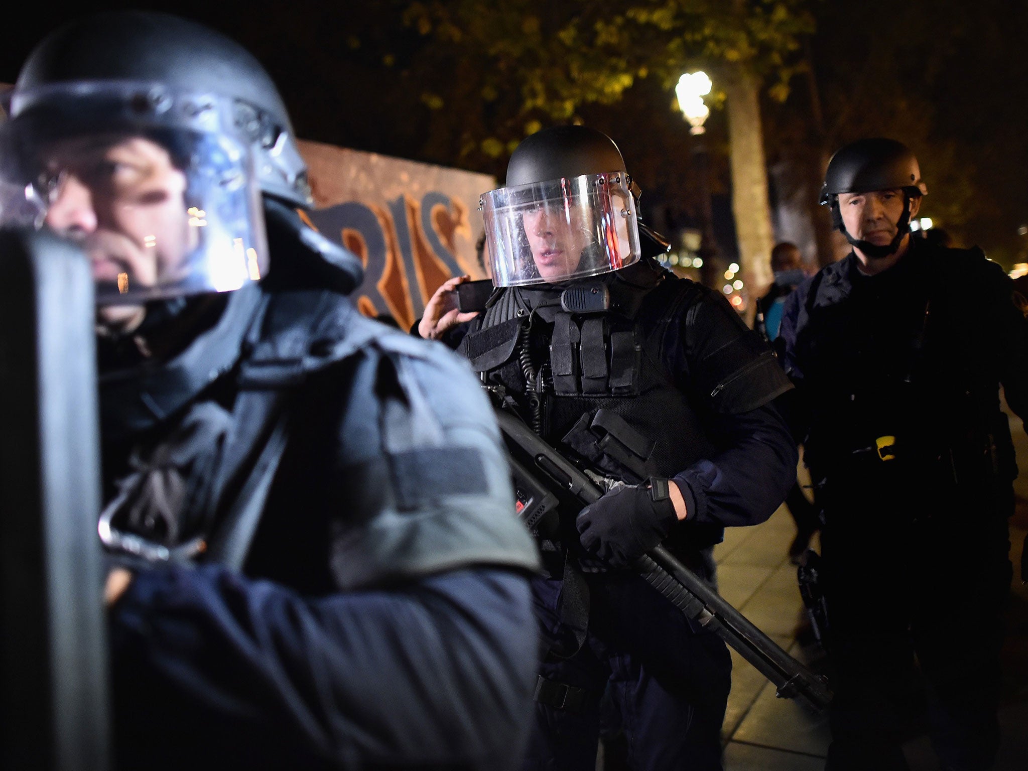 Armed police are deployed in Place de la Republique during an incident later revealed to be a false alarm on November 15, 2015 in Paris, France