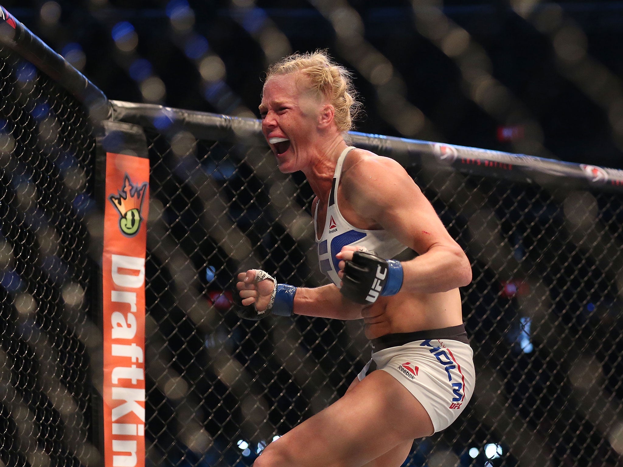 Holm celebrates her victory over Rousey