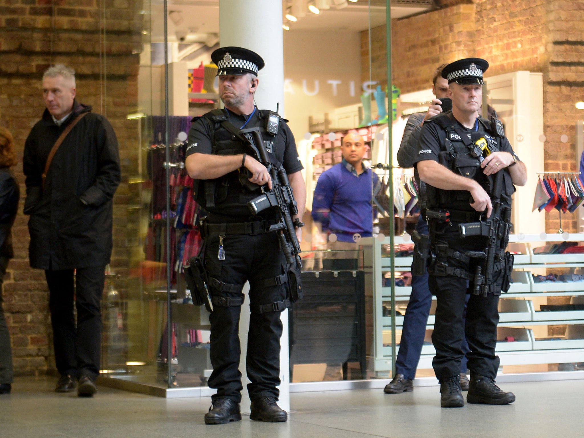 Armed police at St Pancras International Station in London