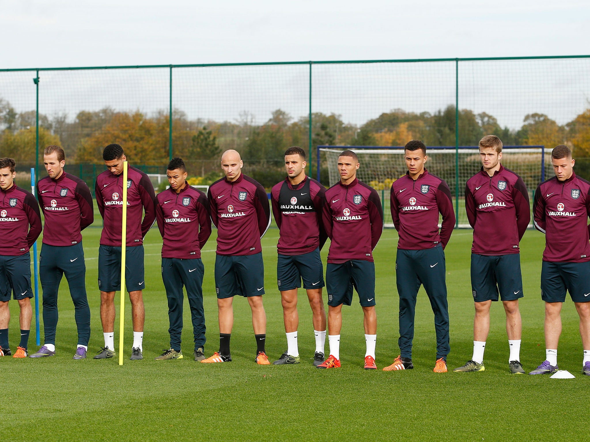 England squad members acknowledge a one-minute silence for the victims of the Paris attacks