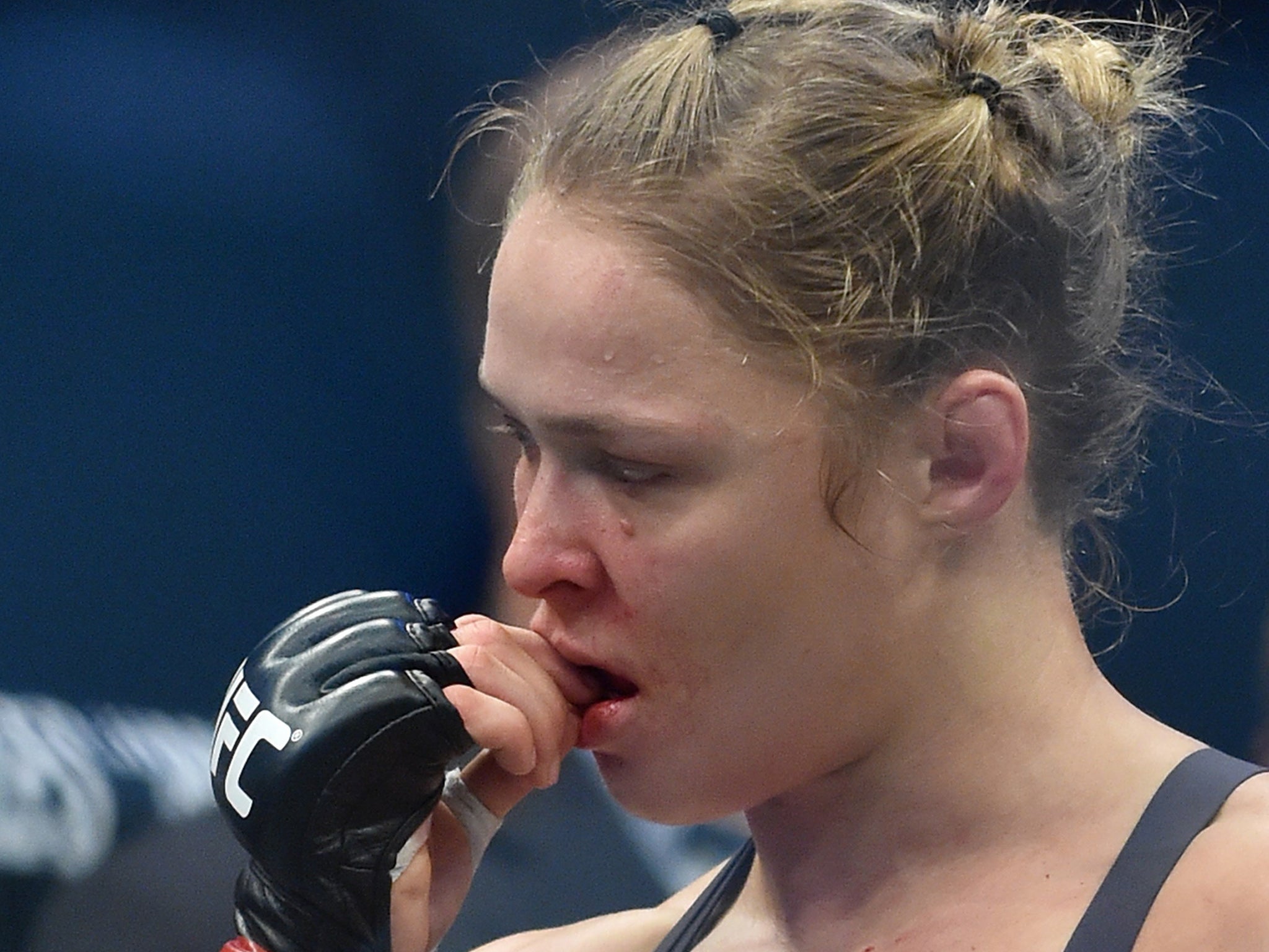 Rousey appears dejected after losing her title to Holm