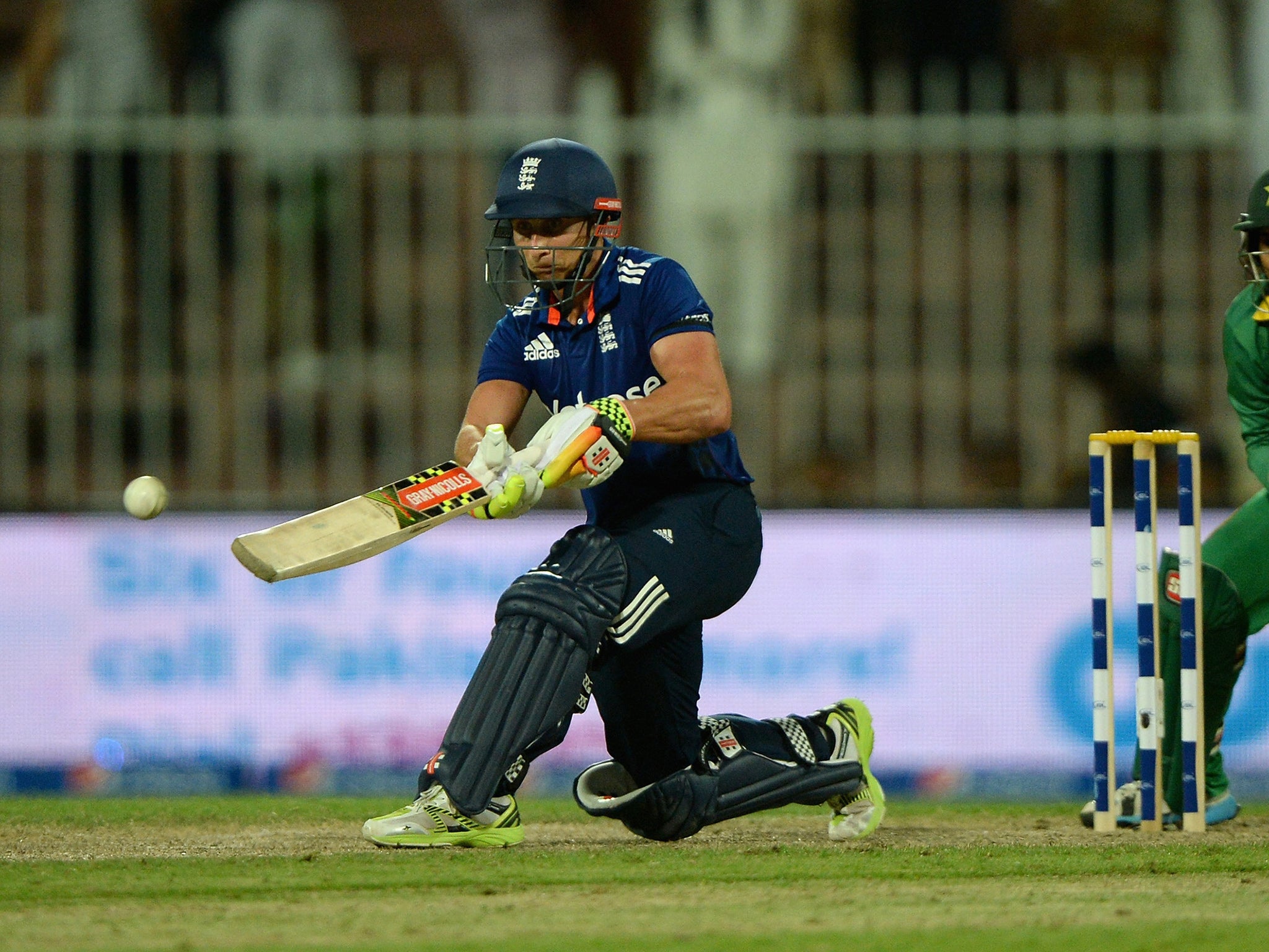 Englad's James Taylor plays a shot