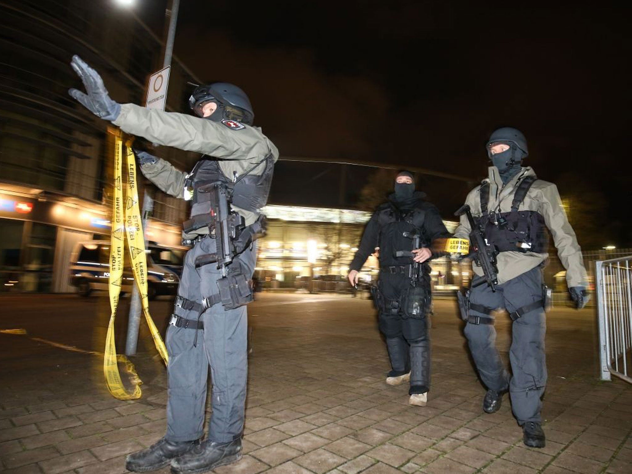 Special police forces cordon off the stadium in Hannover after the soccer friendly match between Germany and the Netherlands was cancelled amid security fears