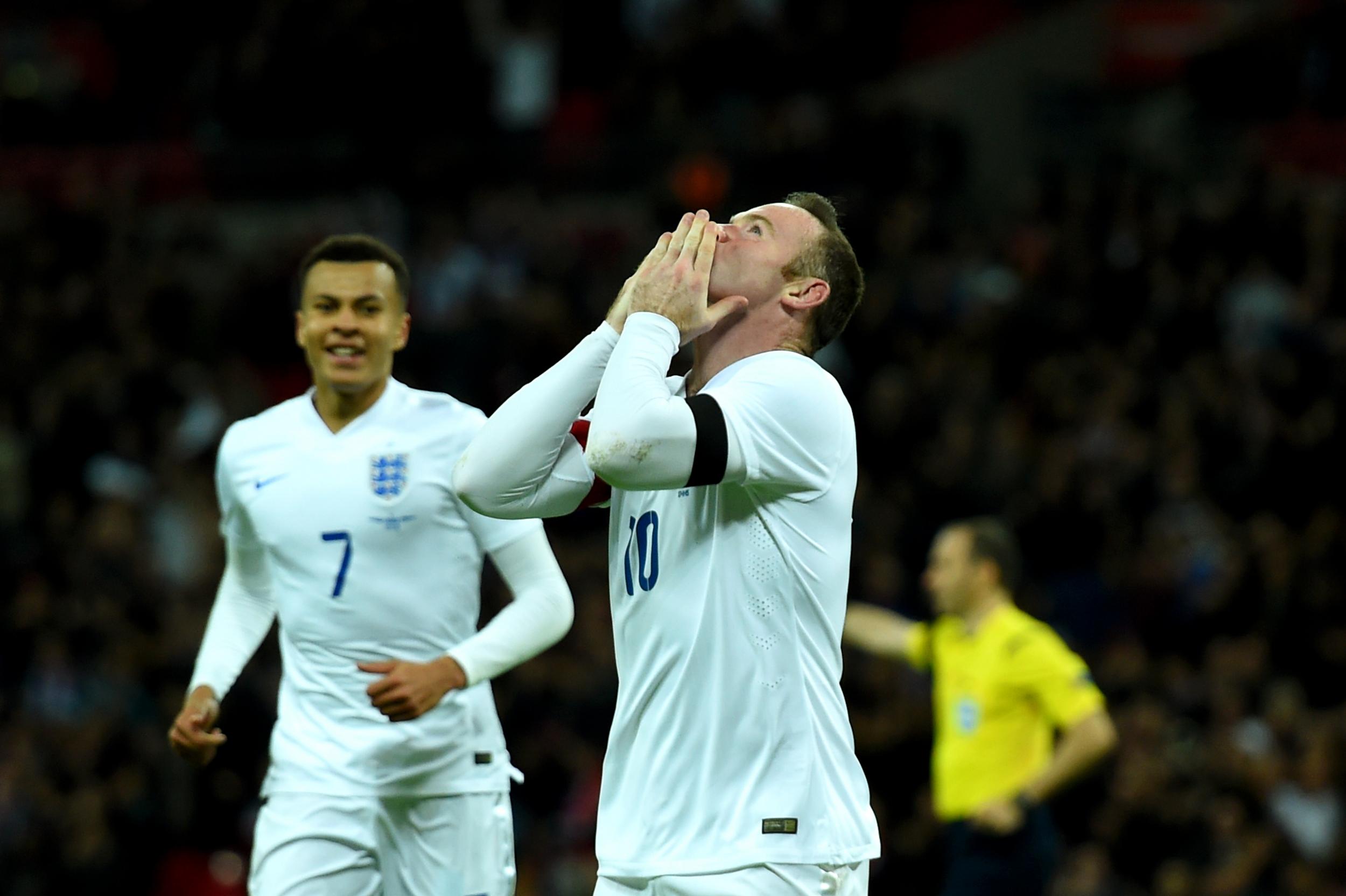 &#13;
Wayne Rooney celebrates scoring England's second&#13;