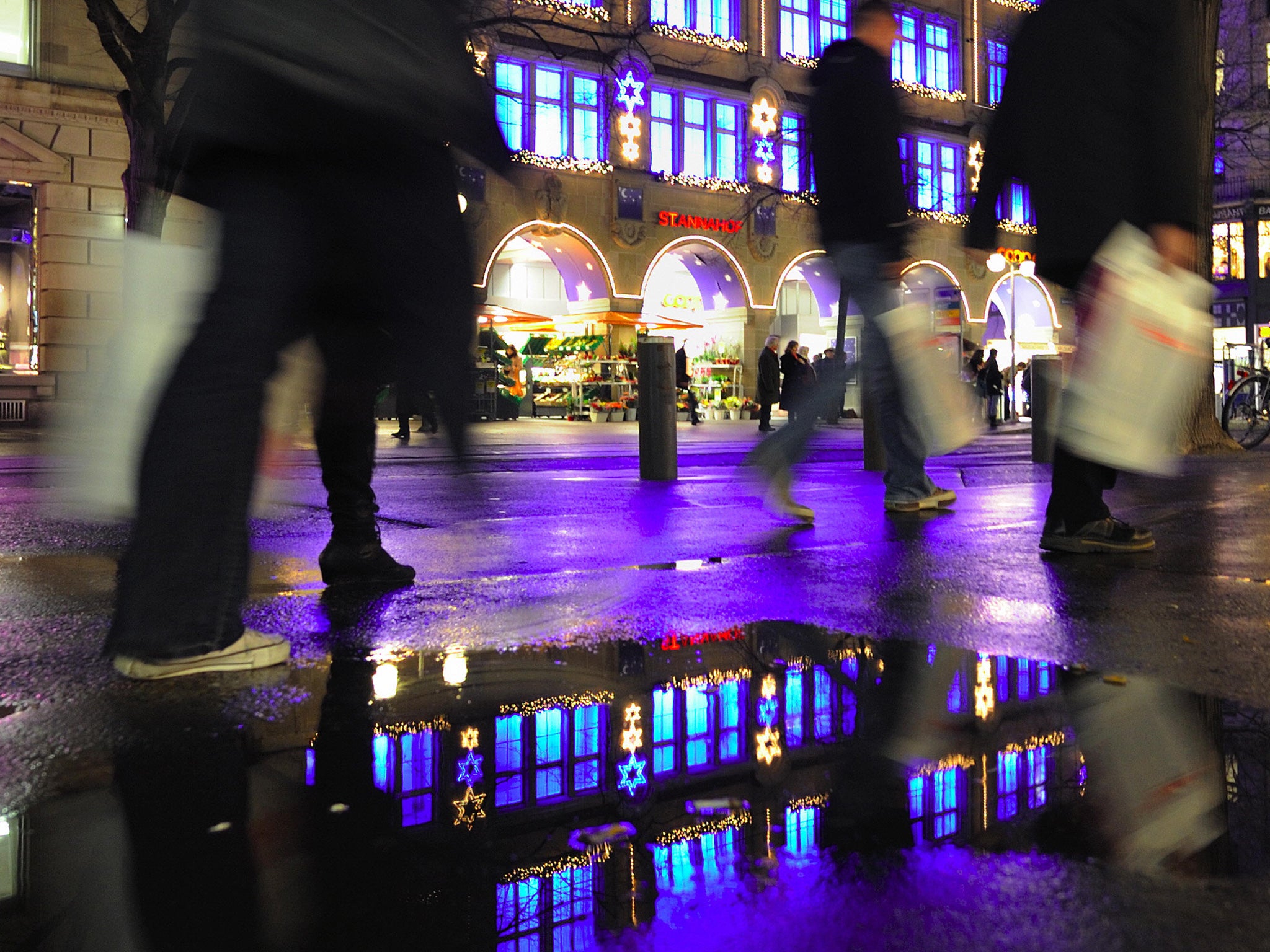 File: Shoppers on Zurich's Bahnhofstrasse. Switzerland currently has some of the strictest laws against government surveillance in Europe