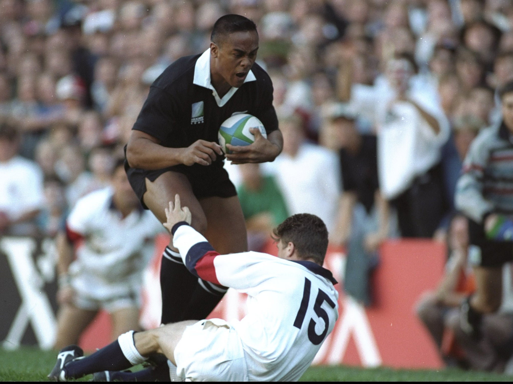 Jonah Lomu charges through Mike Catt in 1995 Rugby World Cup