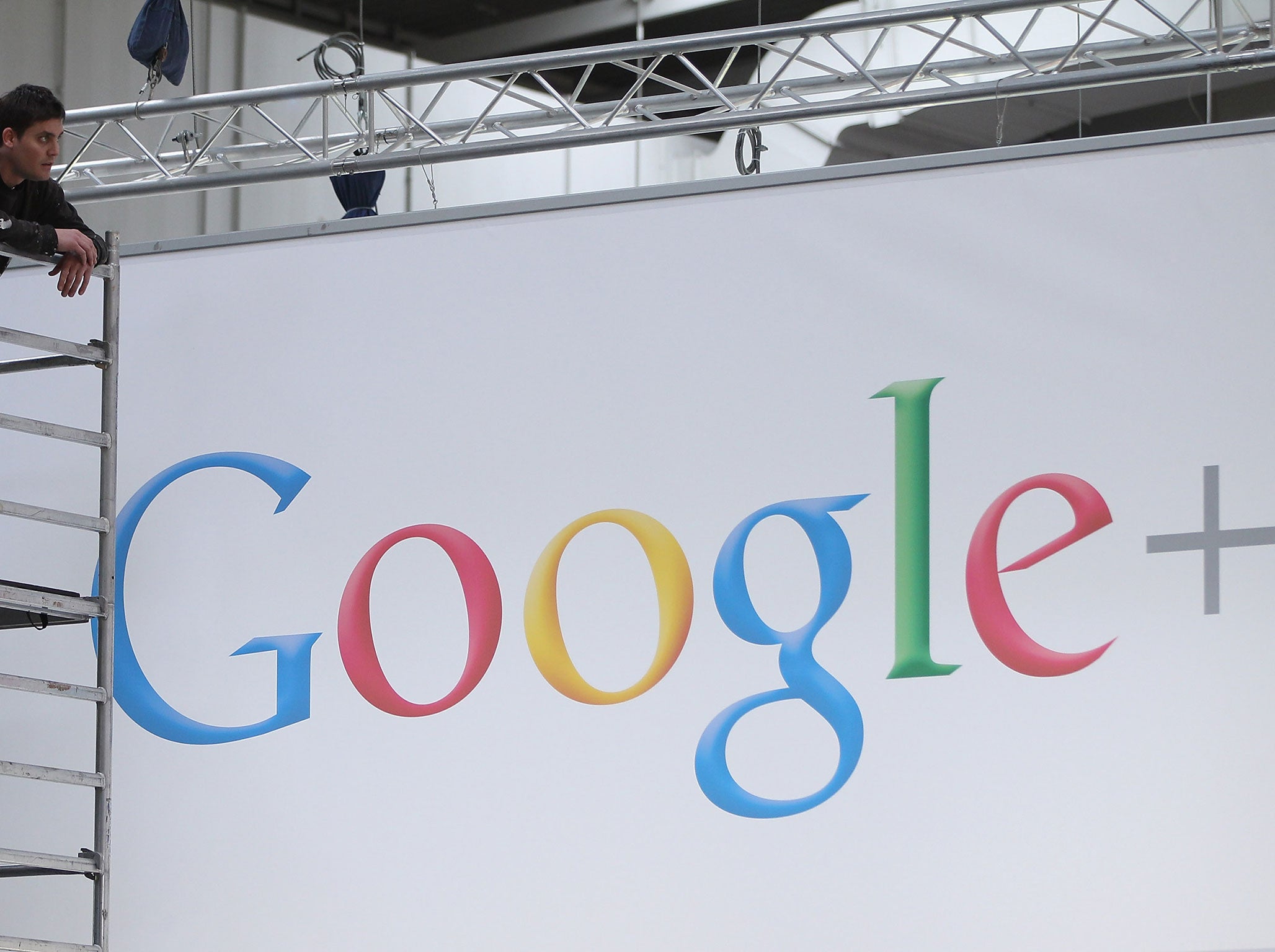 A worker pauses while preparing the Google stand the day before the CeBIT 2012 technology trade fair officially opens to the public on March 5, 2012 in Hanover, Germany