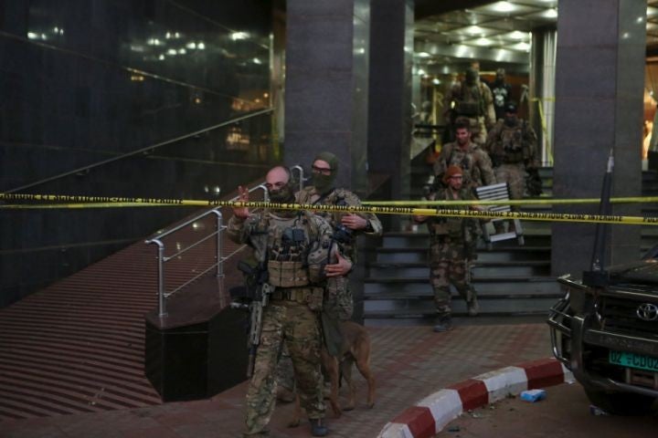 Soldiers move out from the Radisson Blu hotel