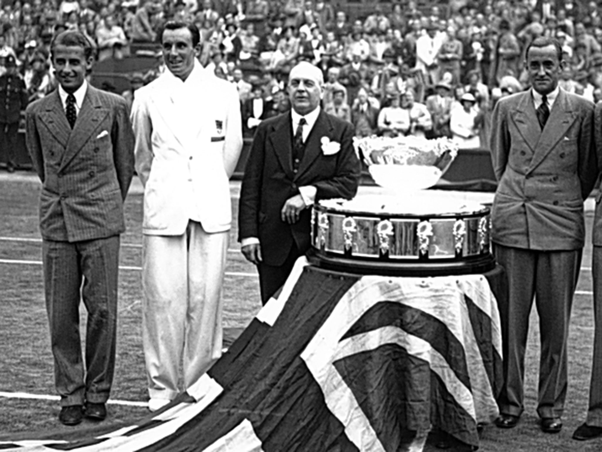 Austin, Perry, Tuckey and Hughes with the ‘birthday cake’ trophy