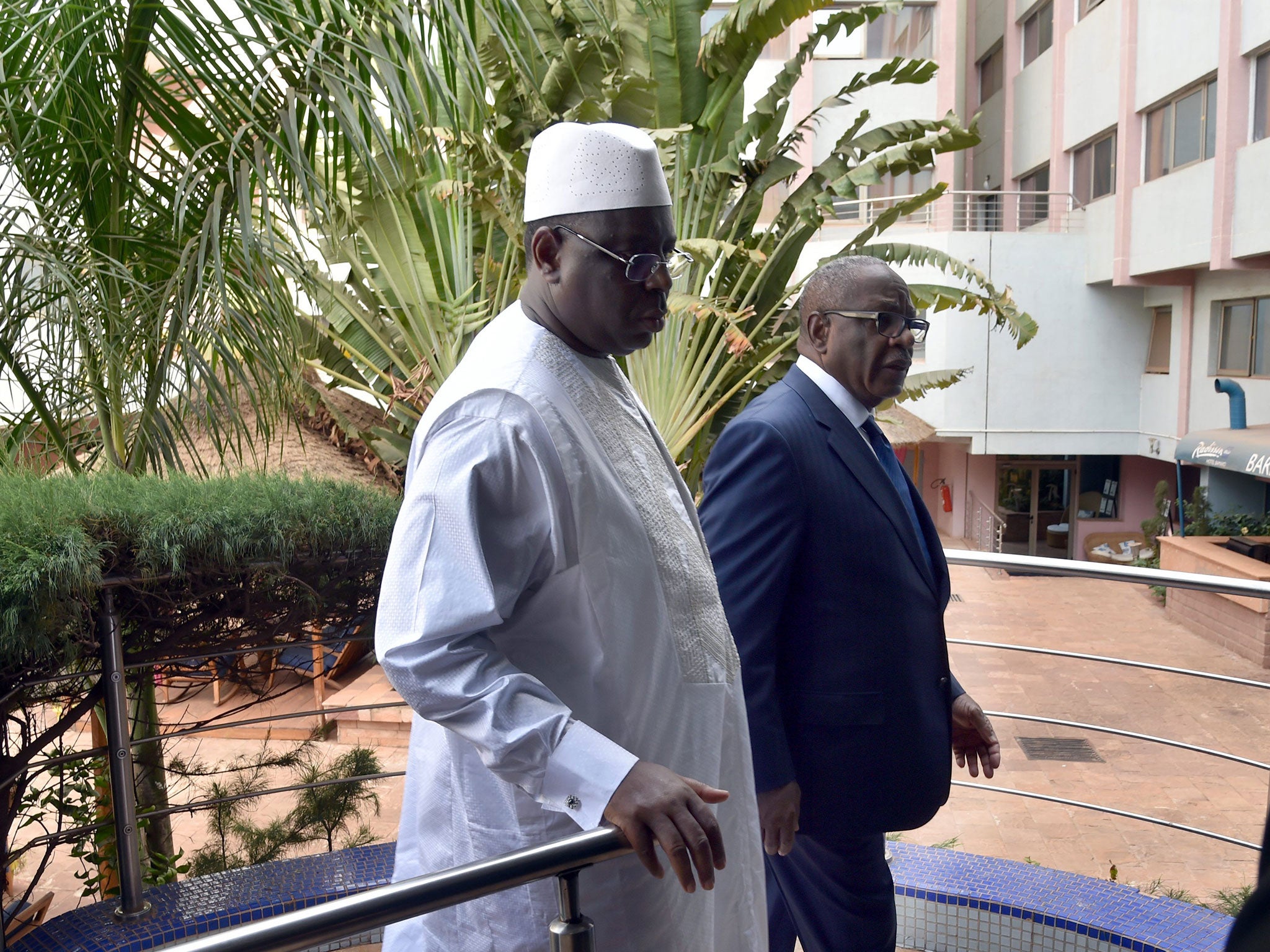 Mali’s President Ibrahim Boubacar Keita, right, with Senegal’s president Macky Sall at the hotel