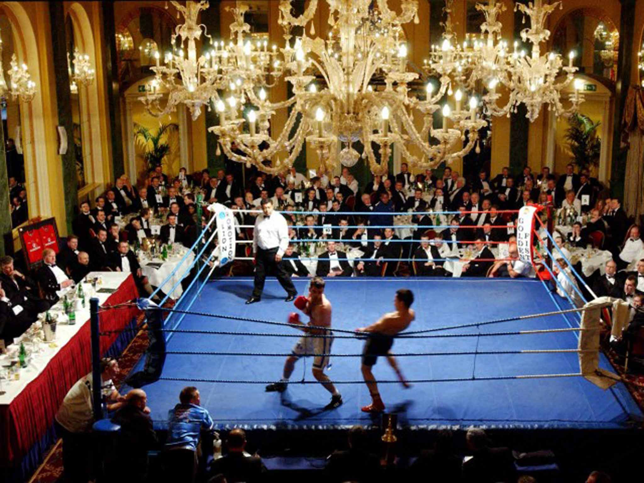 Wilde times: A boxer hits the ropes at a Café Royal event in 2002