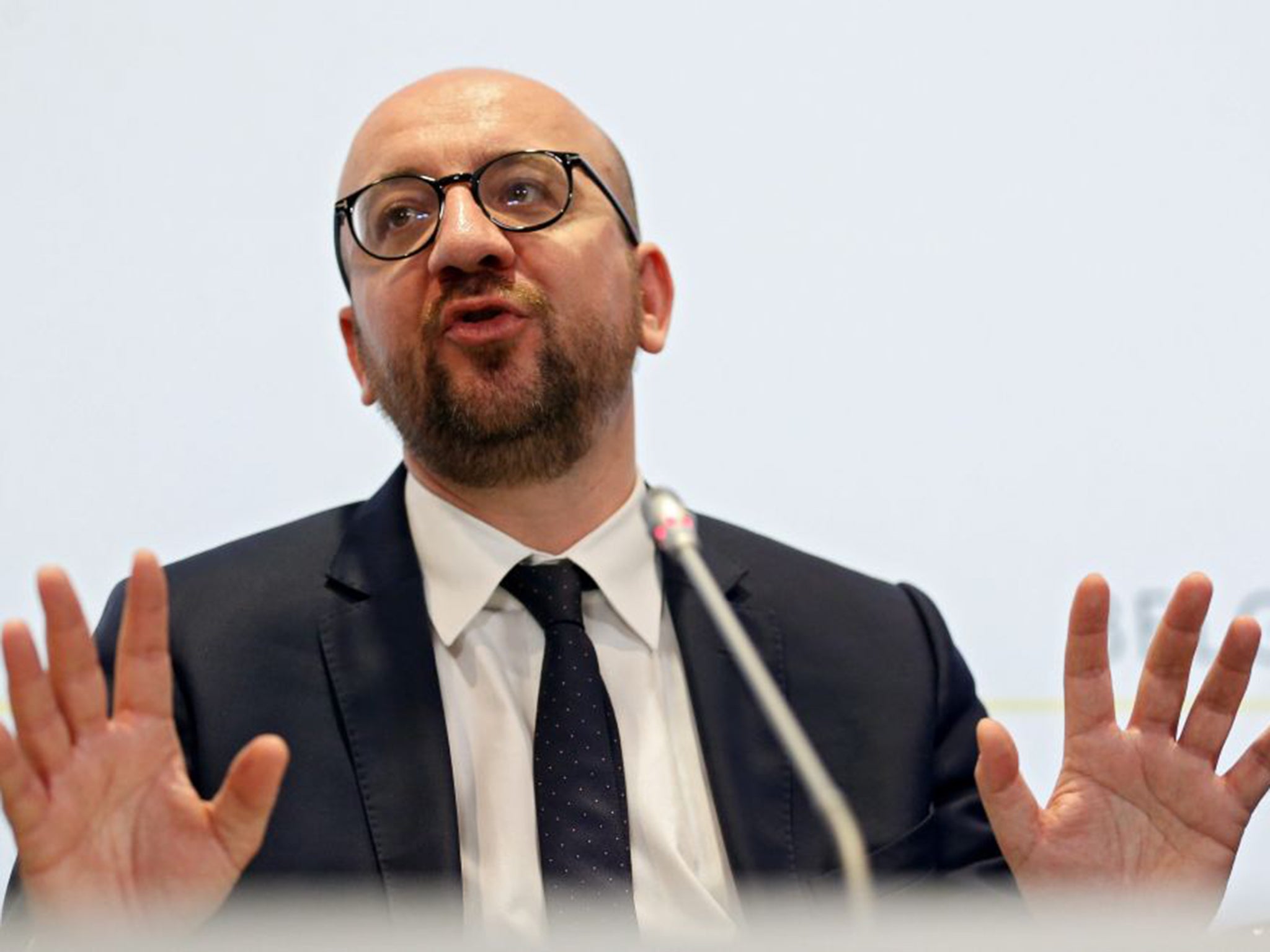 Belgian Prime Minister Charles Michel addresses the media