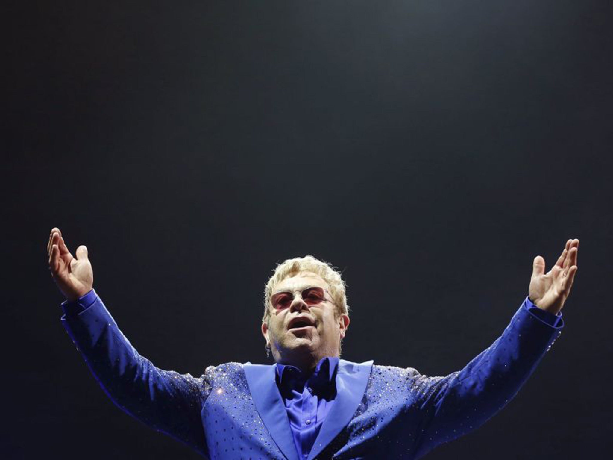 Elton John performs at a concert on the "All The Hits Tour" in Hong Kong