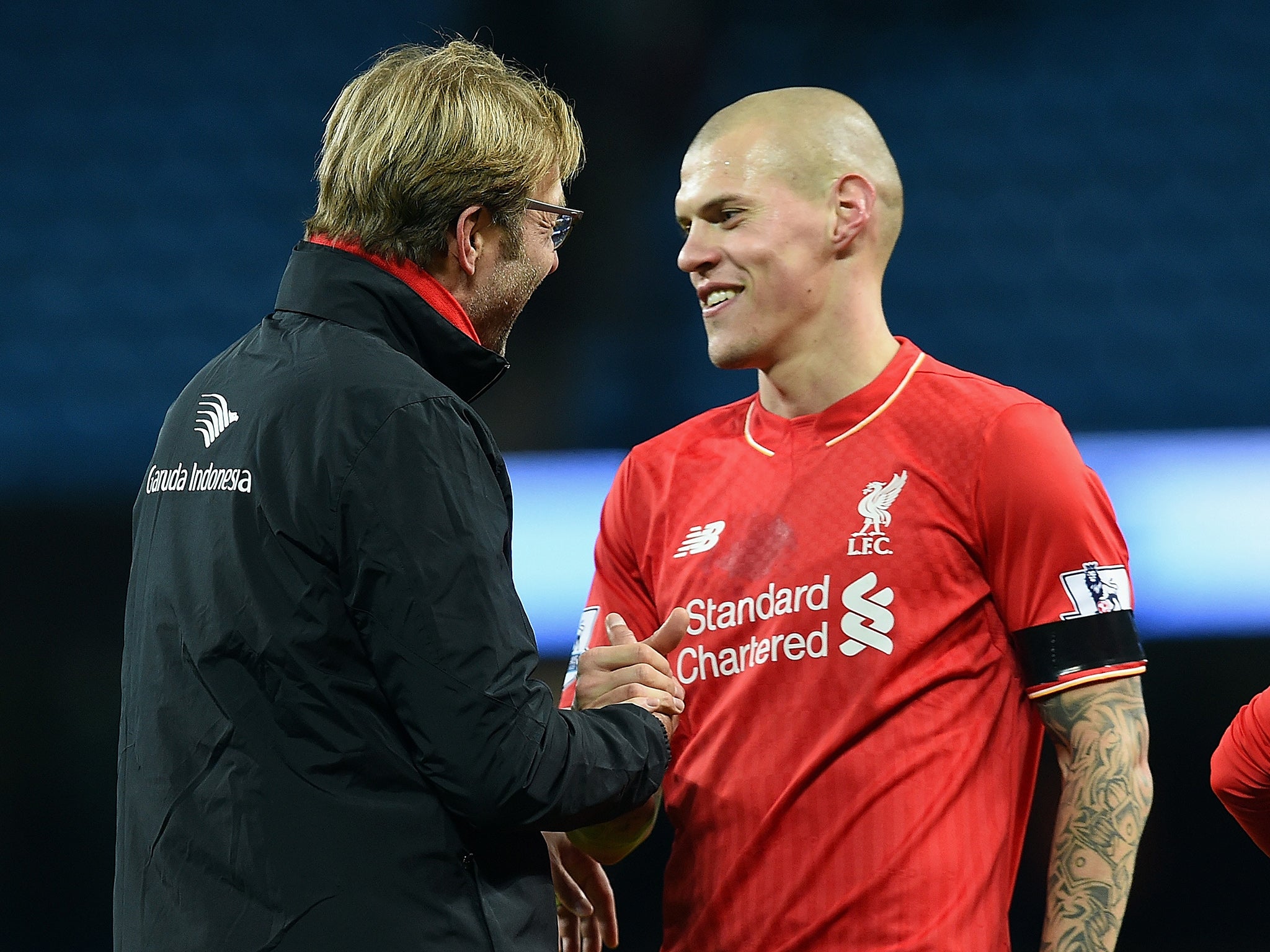Liverpool manager Jurgen Klopp with defender Martin Skrtel