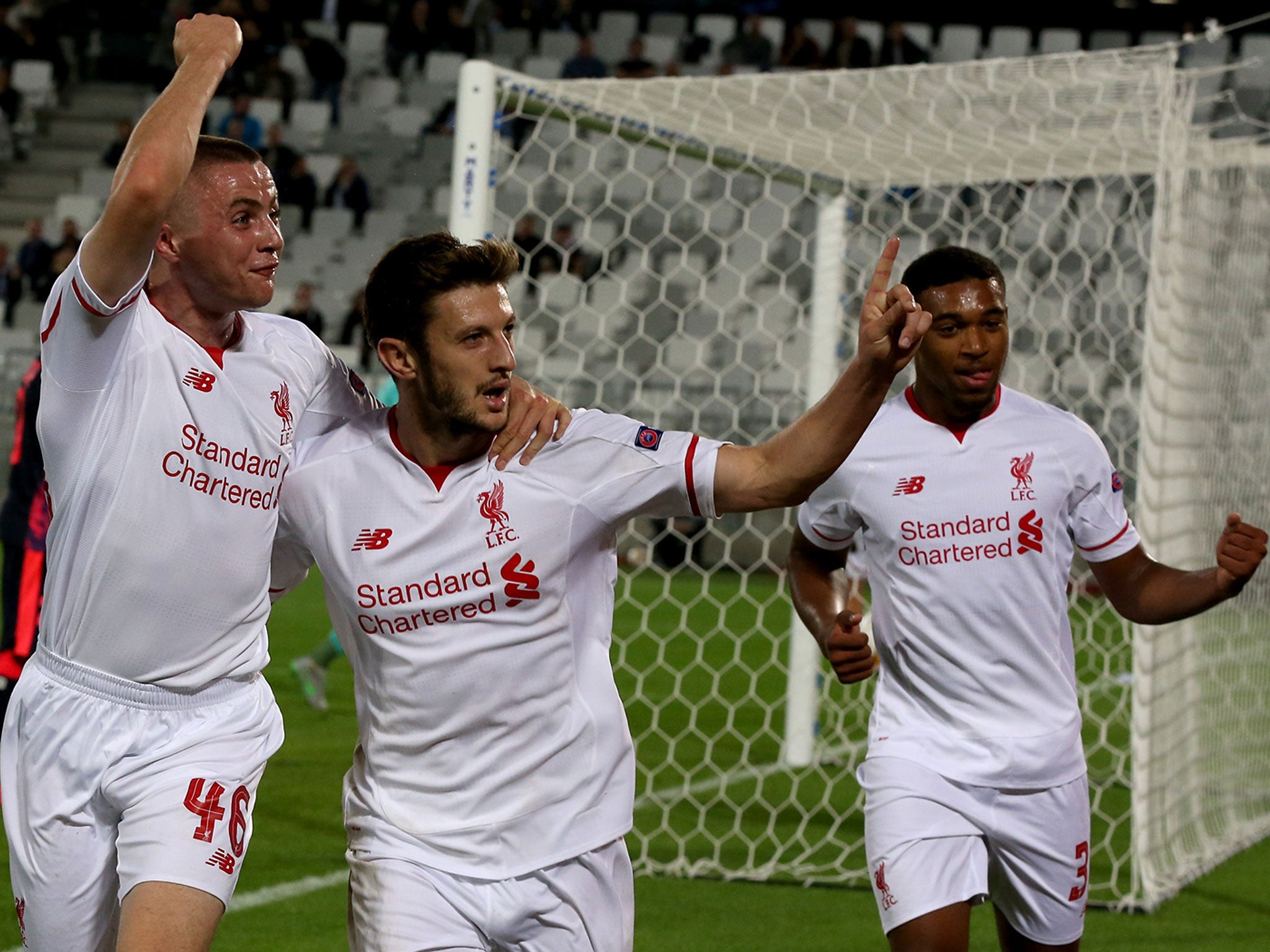 Adam Lallana celebrates scoring against Bordeaux