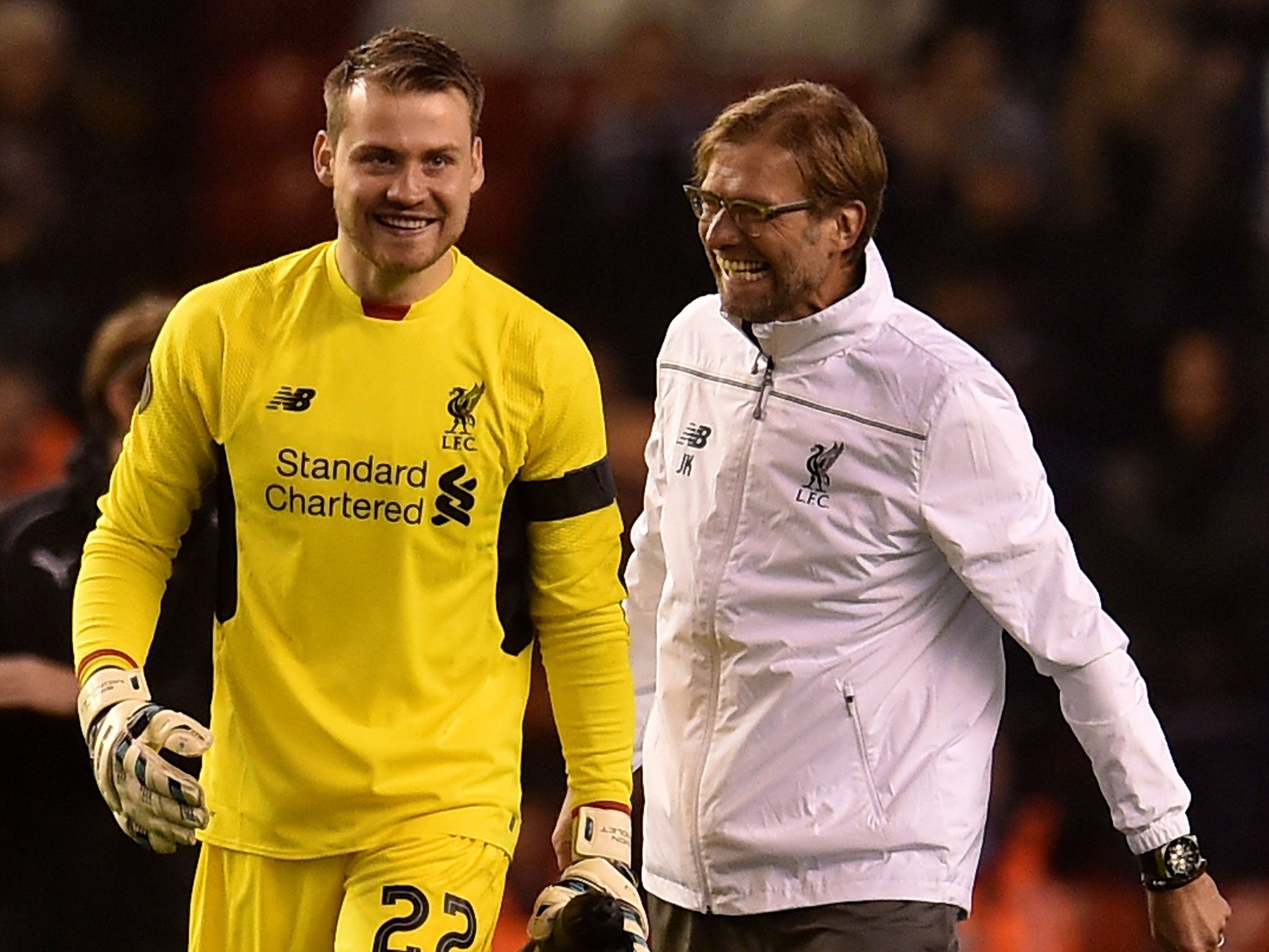 Simon Mignolet shares a joke with Jurgen Klopp after the 2-1 win over Bordeaux