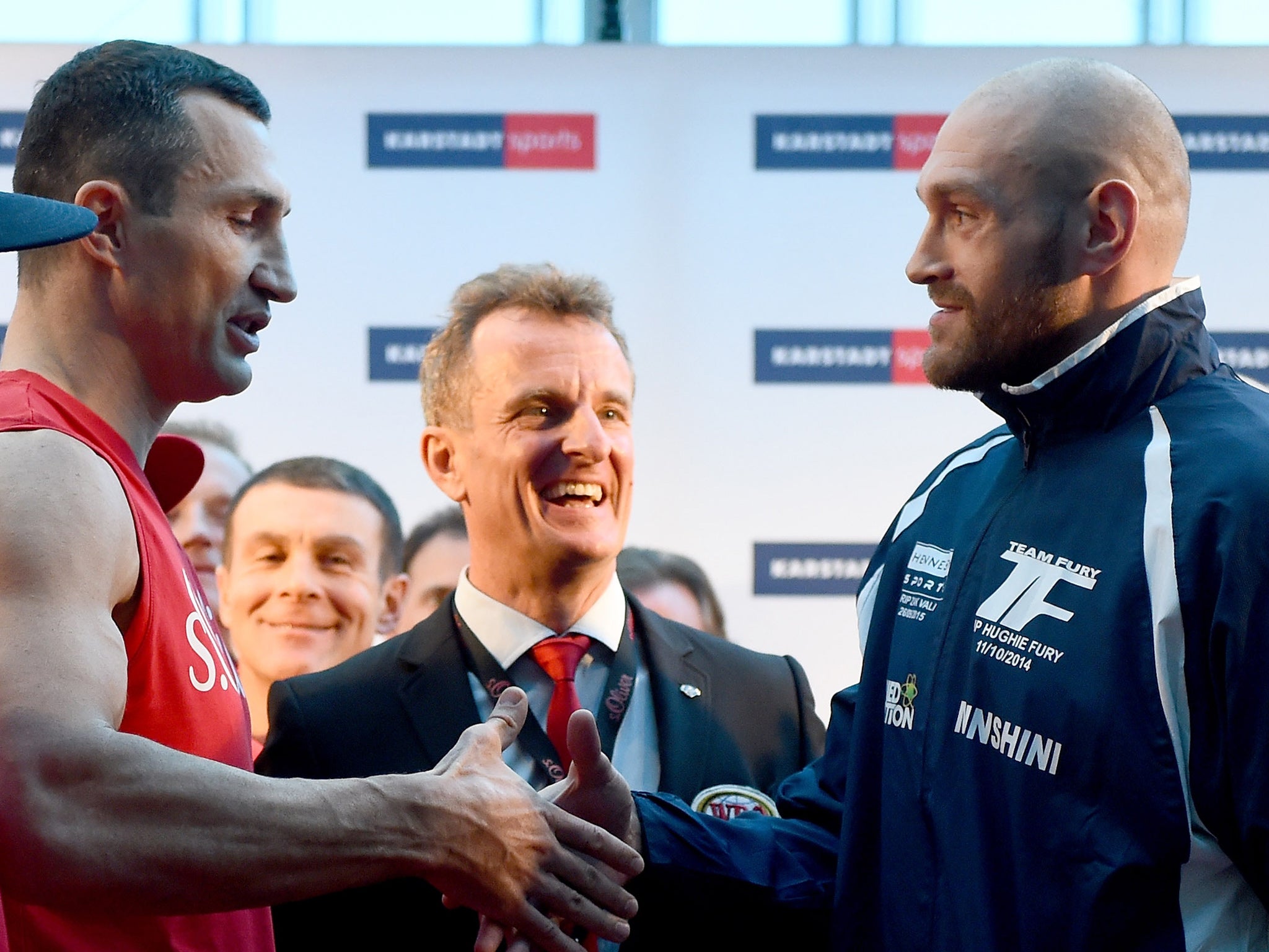 The pair eventually shake hands after the weigh in