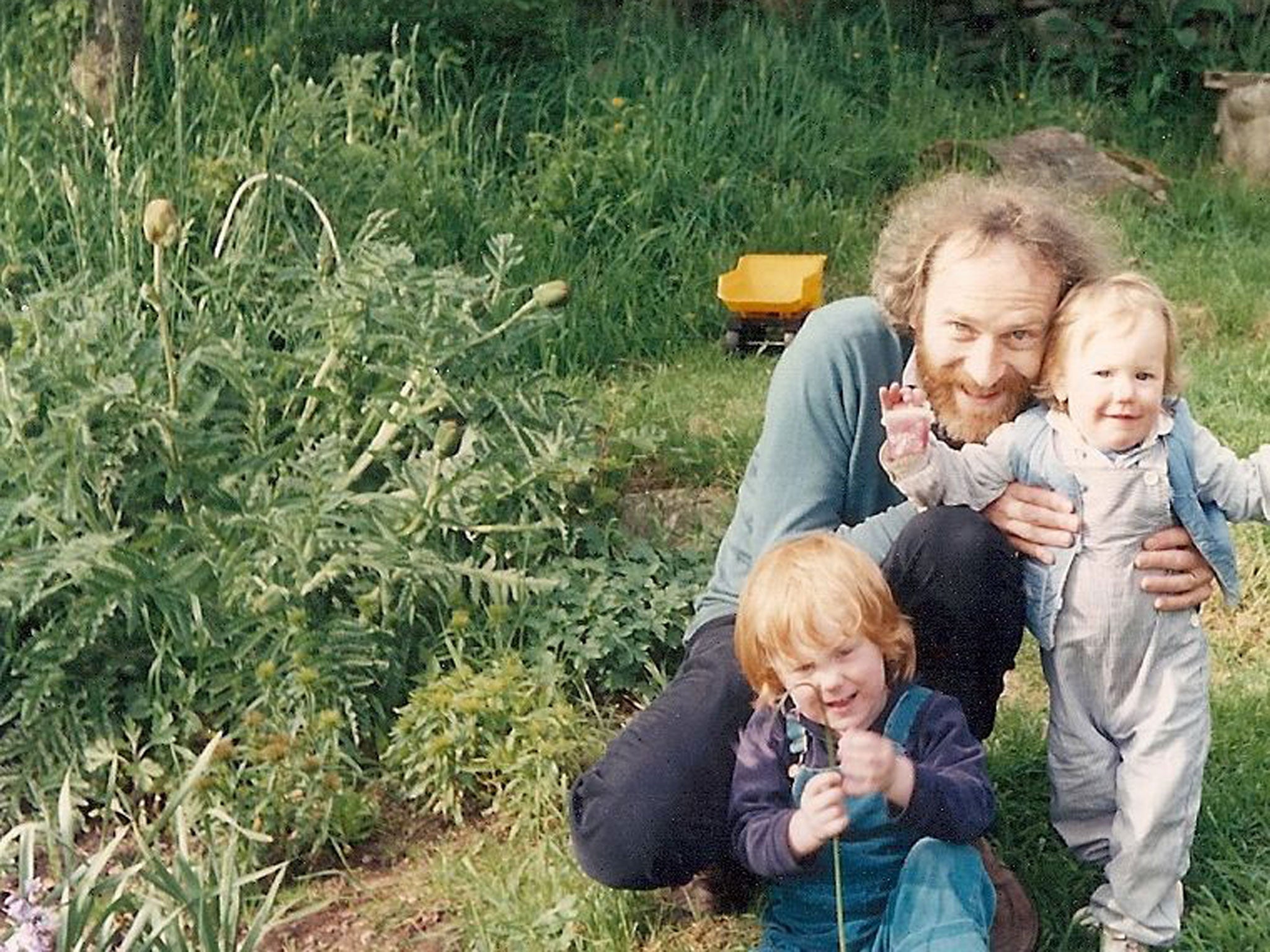 Holly (standing) with her father Martin and brother Lyall, 1987