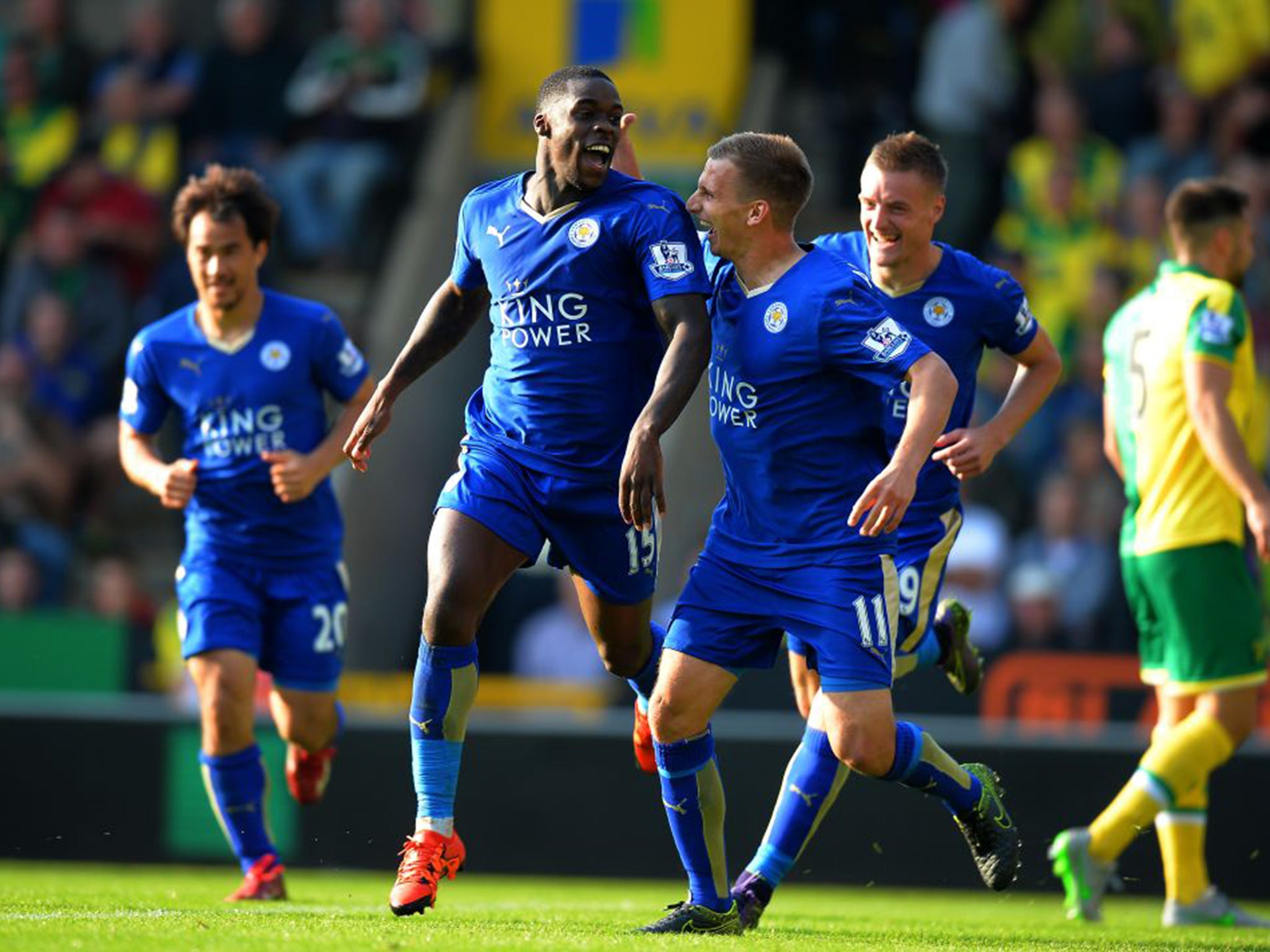 Albrighton celebrating a goal at Norwich with Jeffrey Schlupp