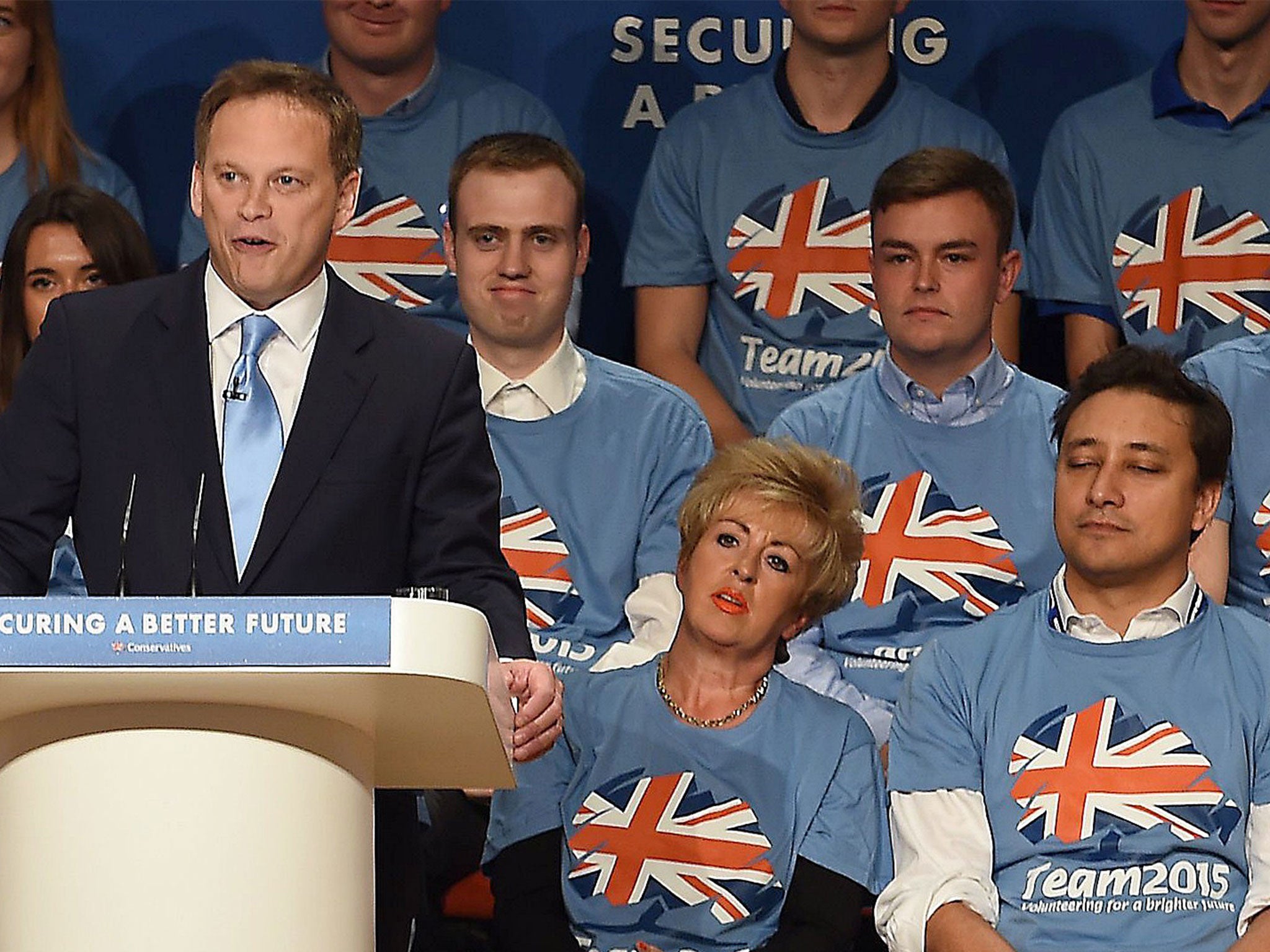 Grant Shapps, left, with Emma Pidding and Mark Clarke, bottom right, during the 2014 Tory conference