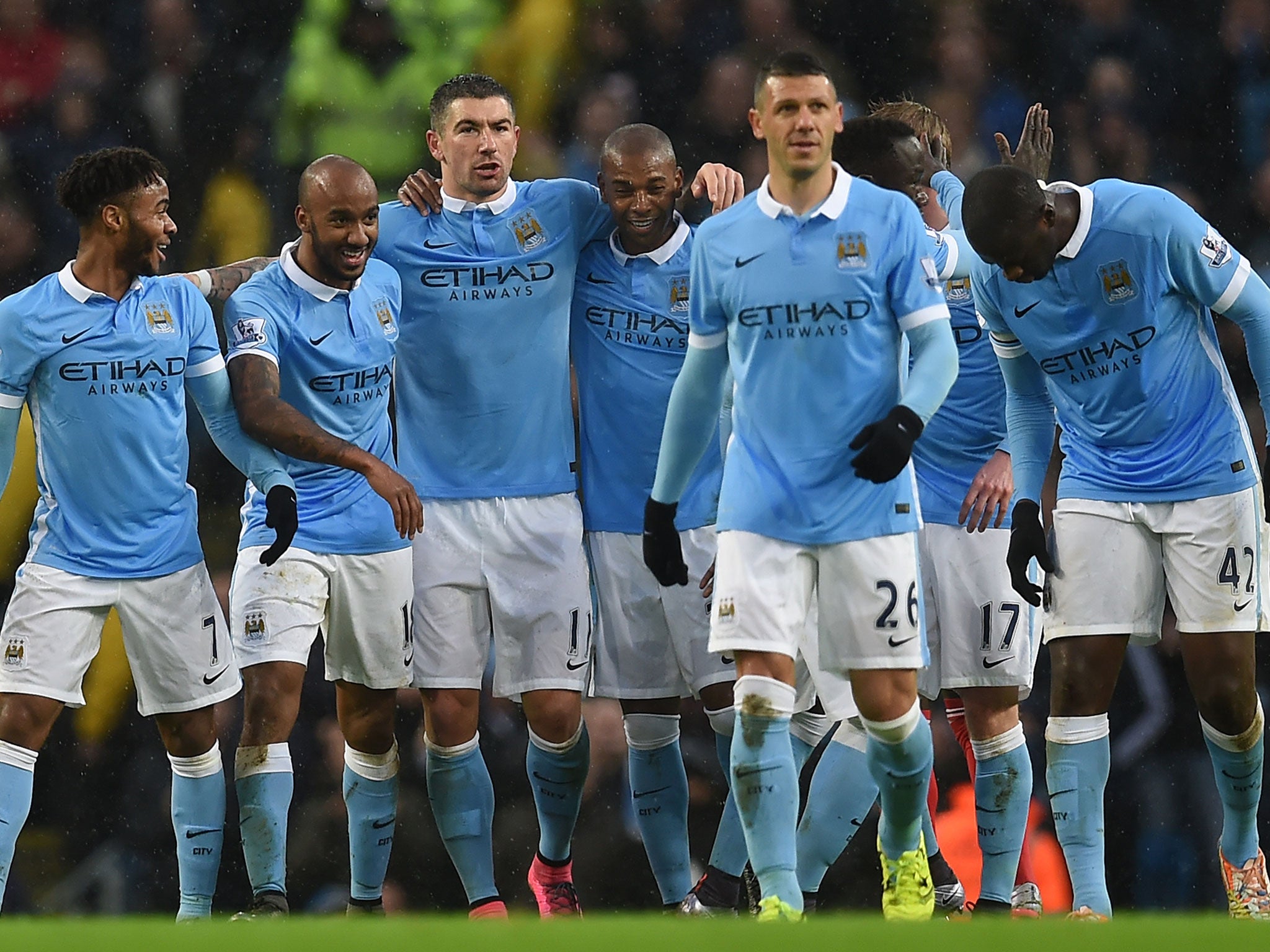 Manchester City players celebrate Aleksandar Kolarov's goal against Southampton