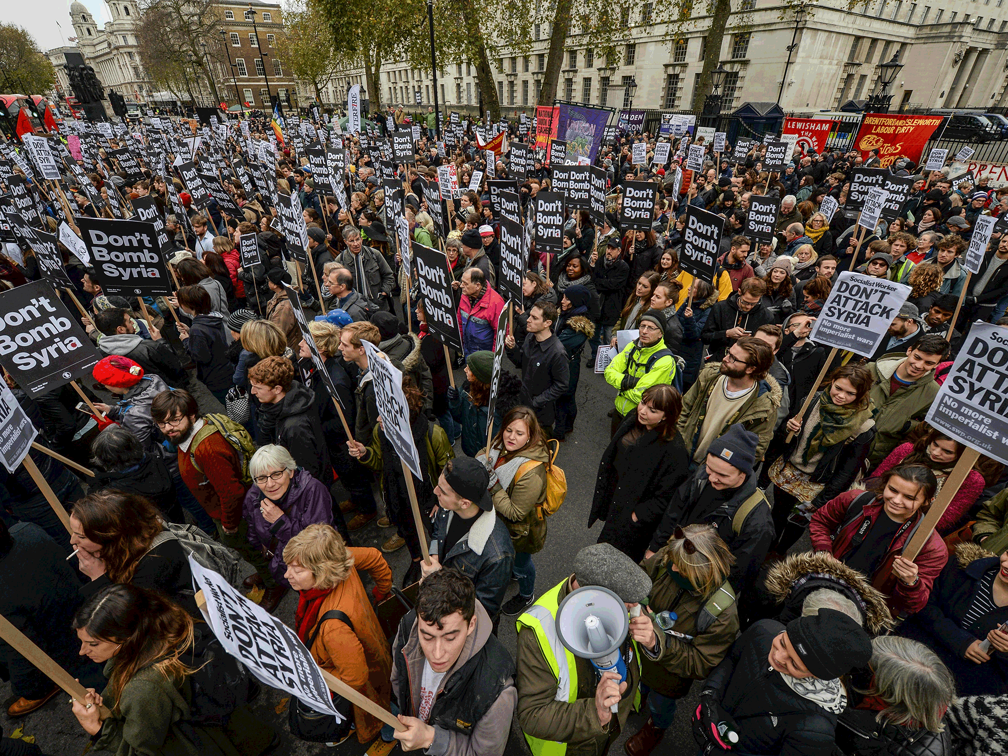 'Don't Bomb Syria' signs crowd the skyline next to the Cenotaph Getty Images