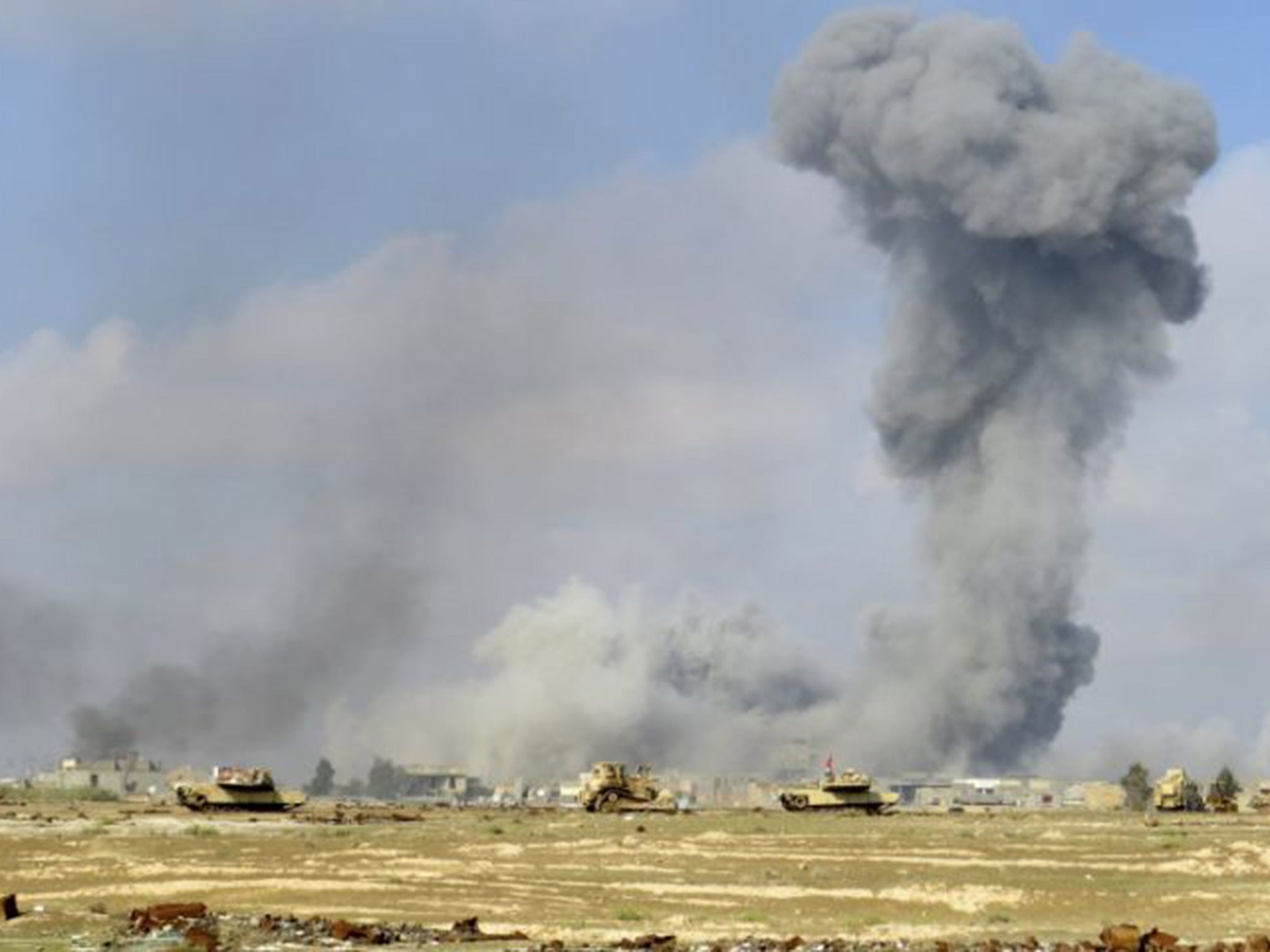 Smoke rises from Islamic State positions following a U.S.-led coalition airstrike