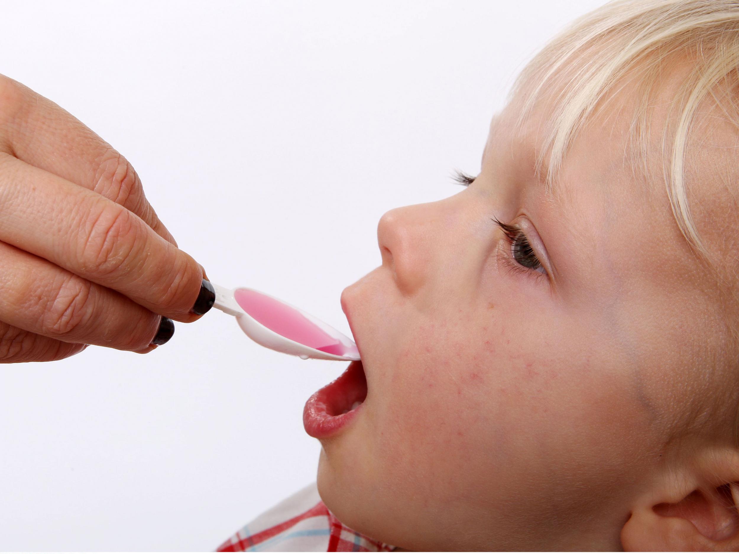 A child being given paracetamol-based medicine, Calpol