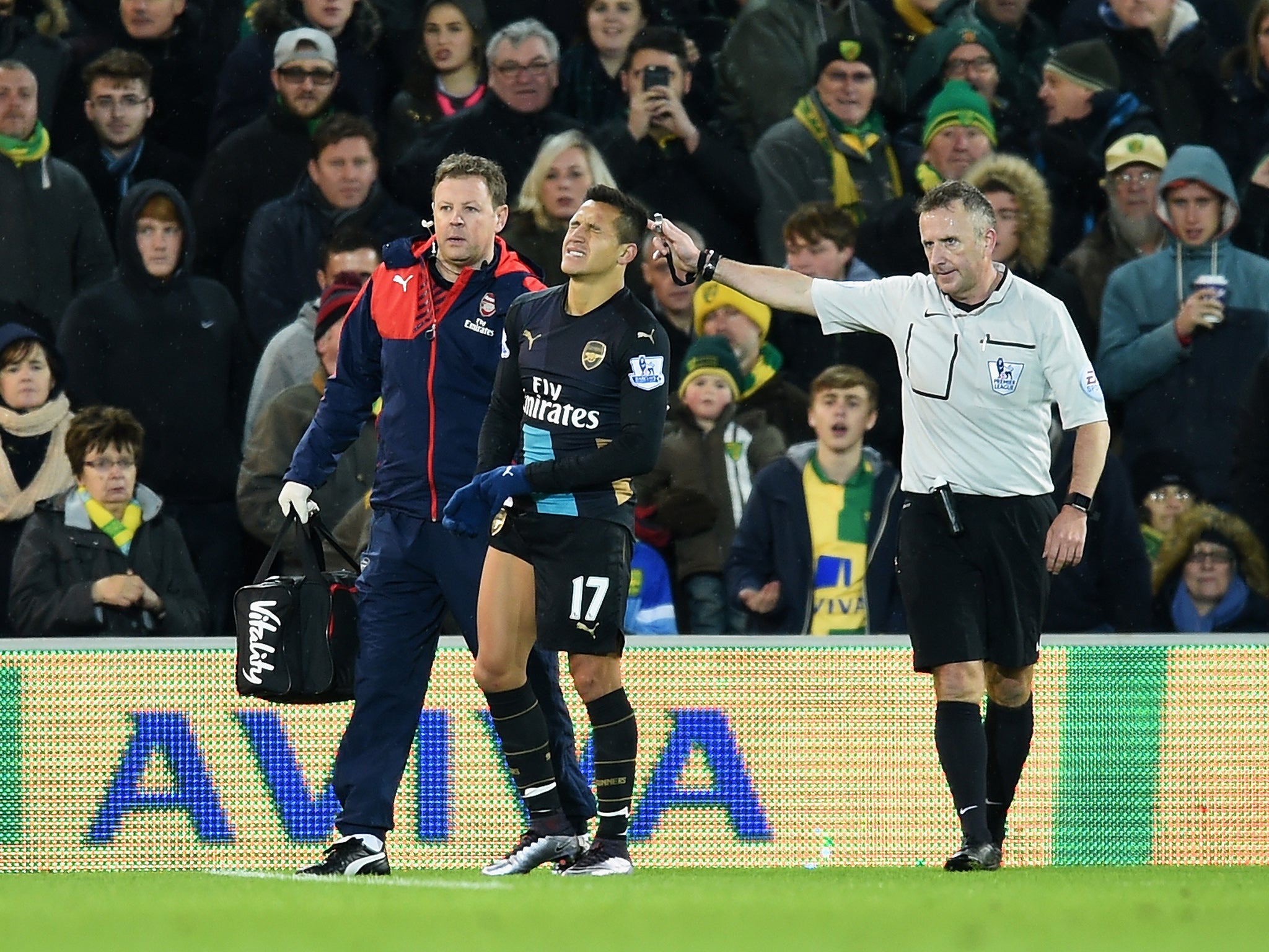 Alexis Sanchez limps off at Carrow Road