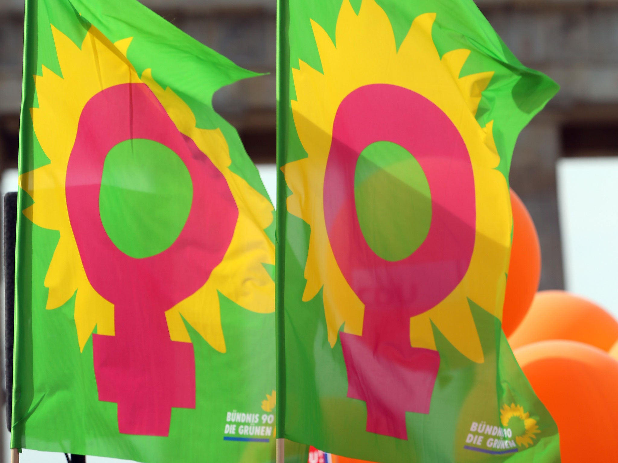 Protesters campaign for equal pay rights in front of the Brandenburg Gate