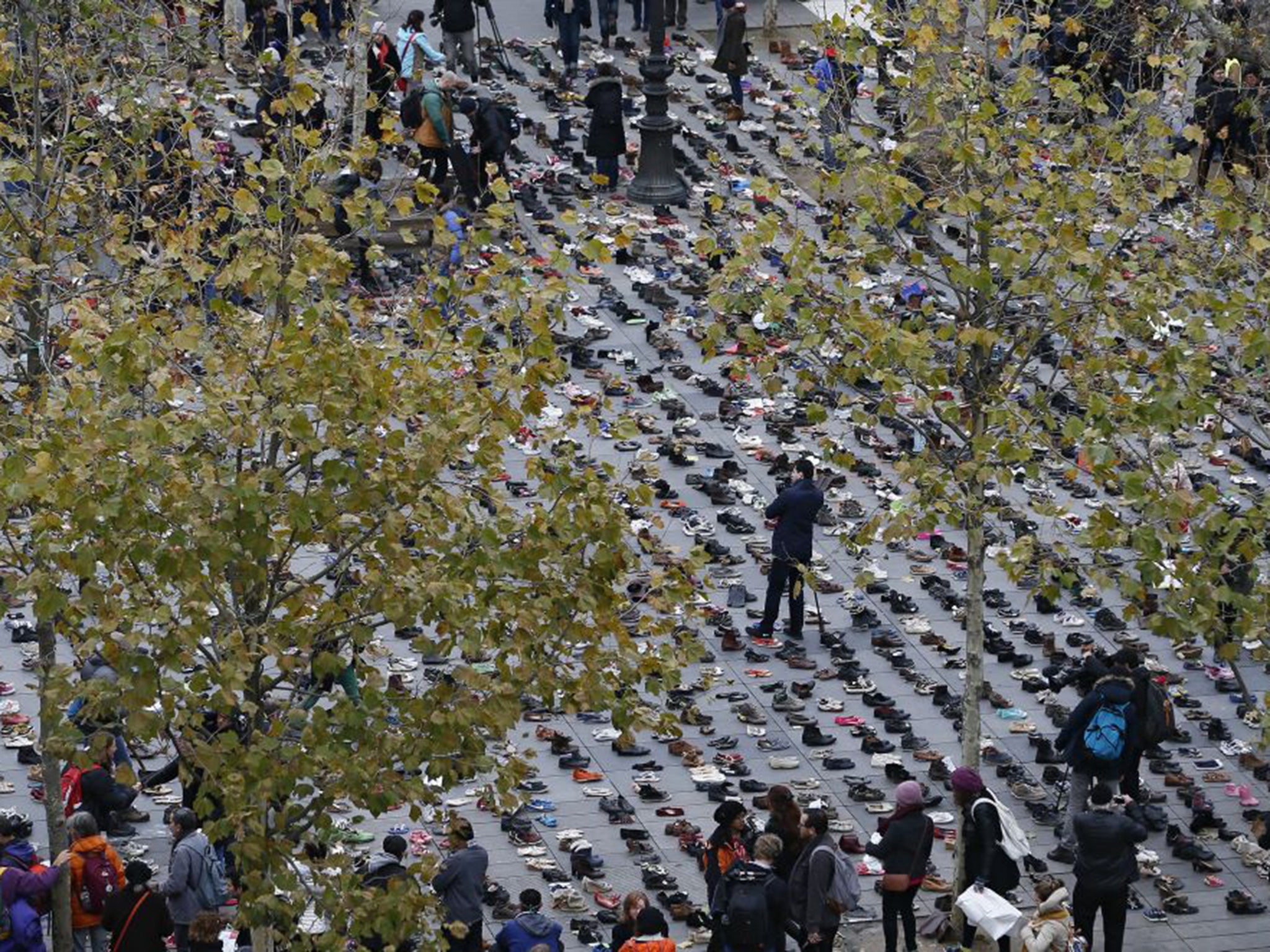 Thousands of pairs of shoes at the Place de la Republique on the eve of the COP21 Conference opening