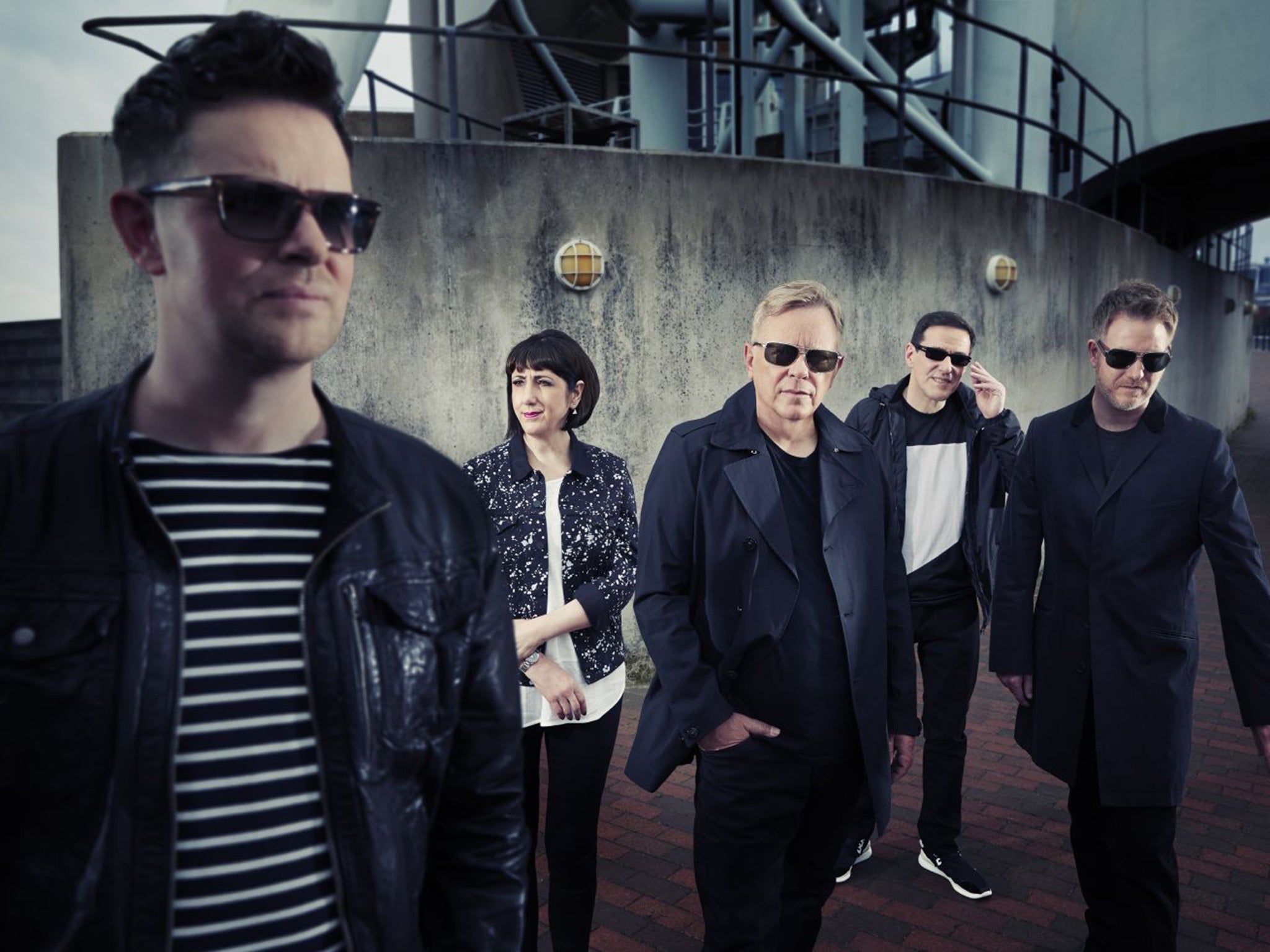 The current incarnation of New Order, including original members Gillian Gilbert, Bernard Sumner,centre, and Stephen Morris, second right