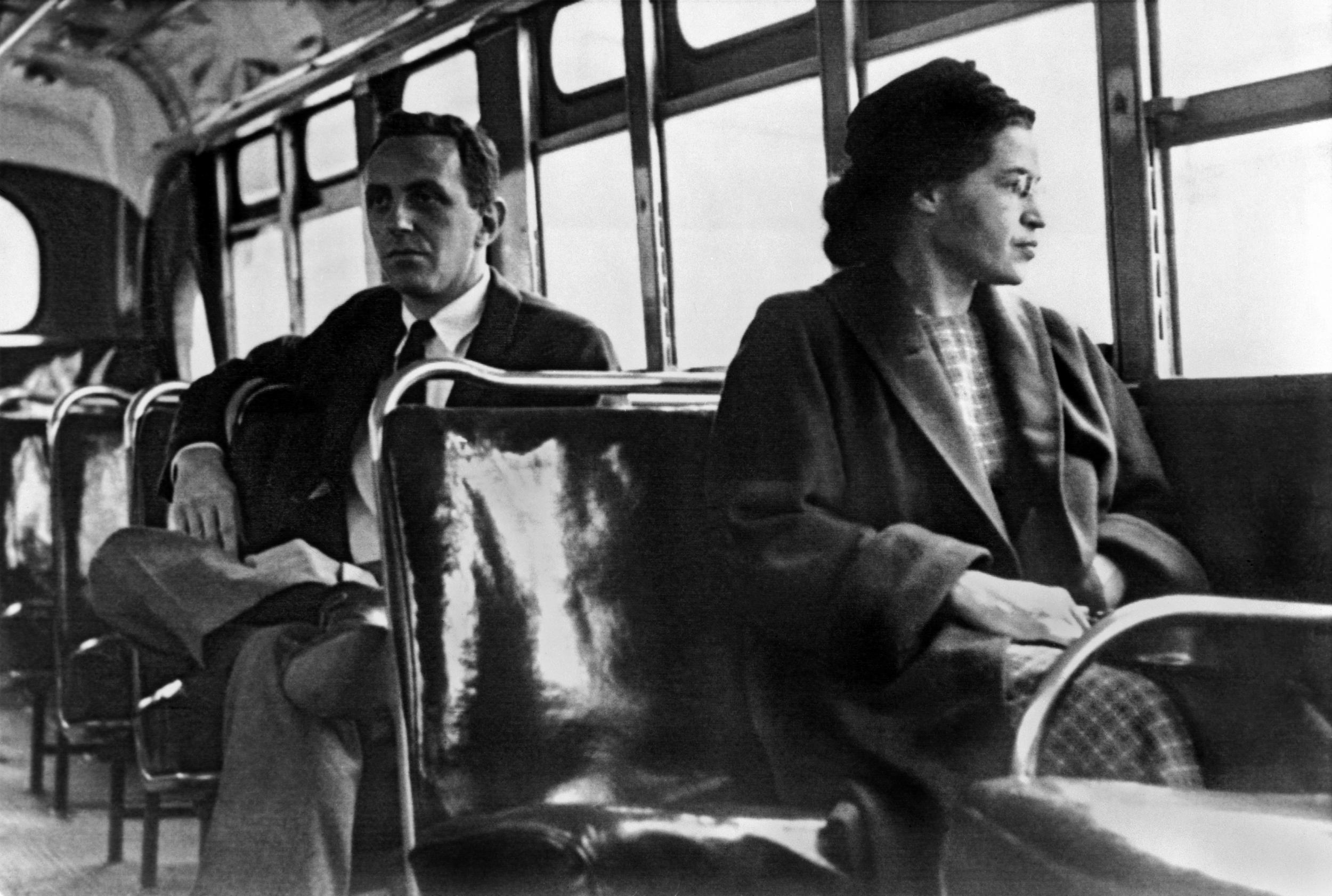 ”Rosa Parks seated toward the front of the bus in Montgomery, Alabama in 1956.