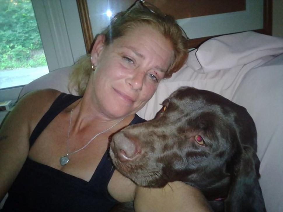 Katharine F Lemansky appears in a Facebook photo with her dog. Facebook