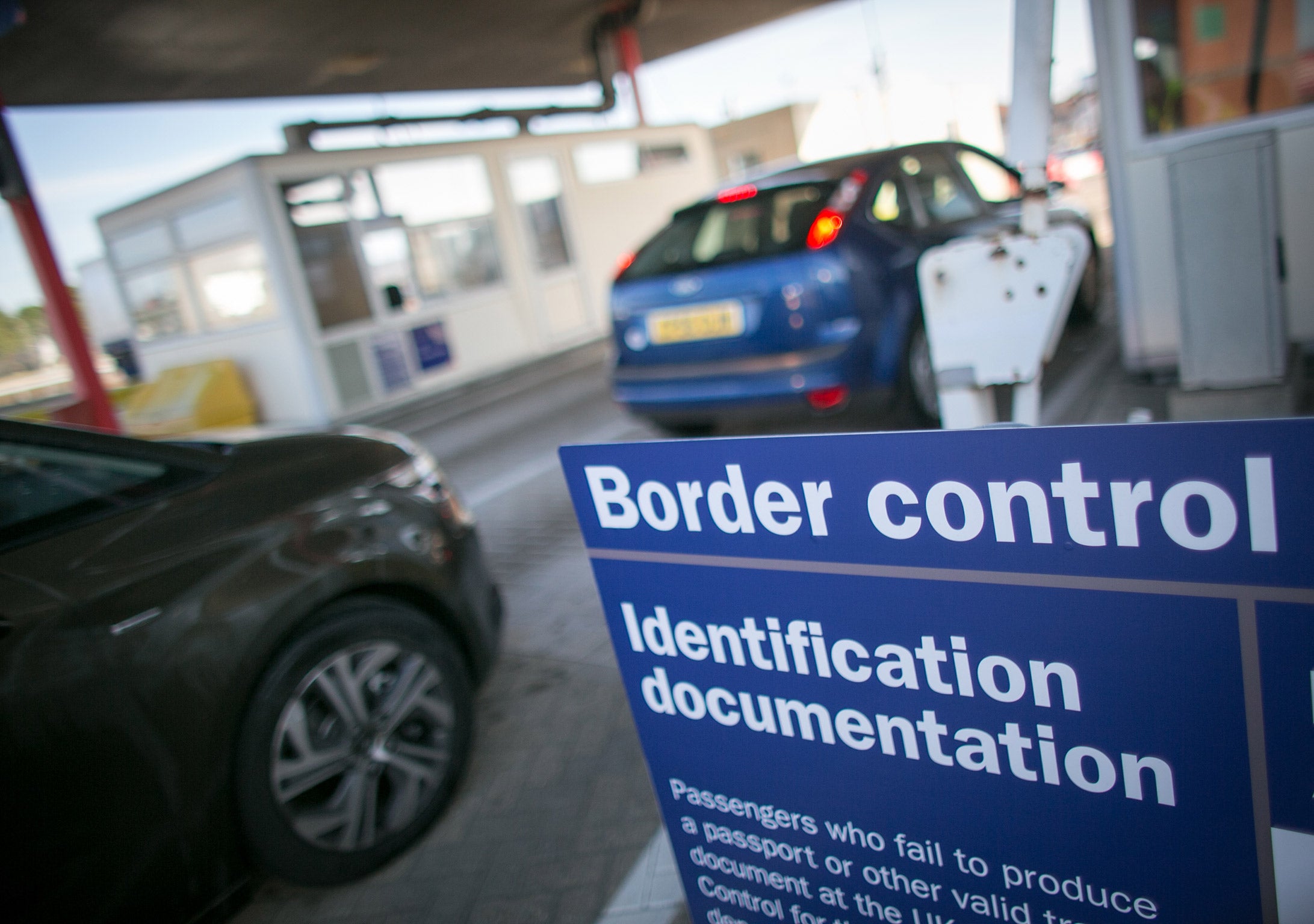 Motorists arrive at the UK border after leaving a cross-channel ferry in Portsmouth