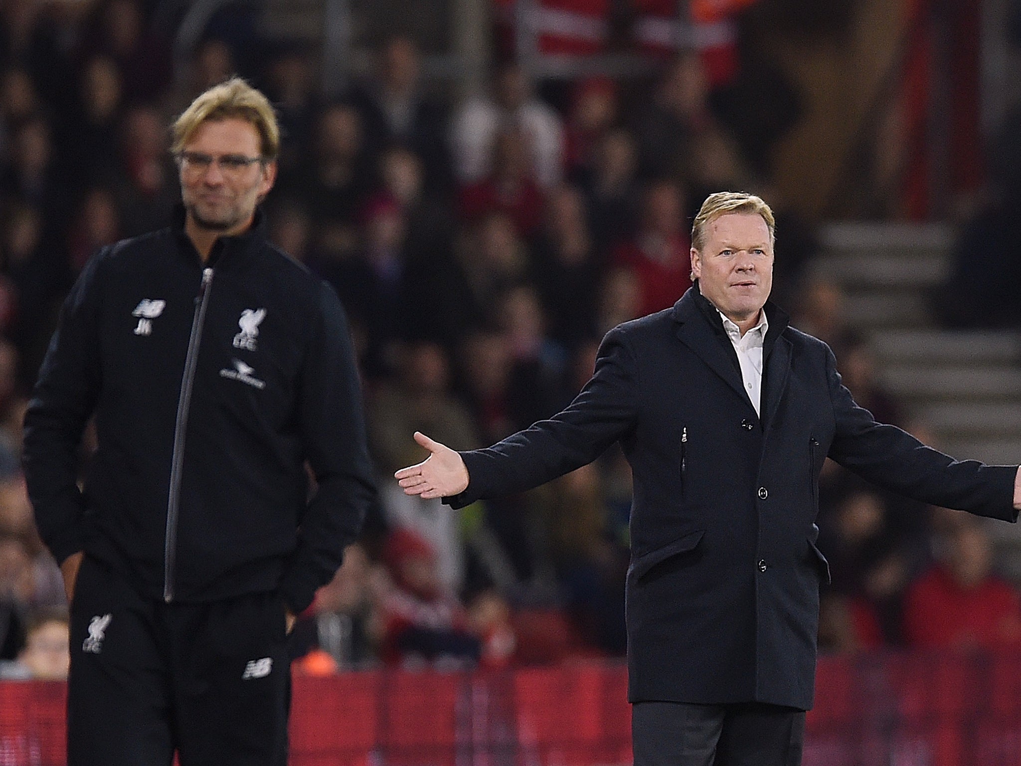 Ronald Koeman (right) reacts on the touchline next to Jurgen Klopp