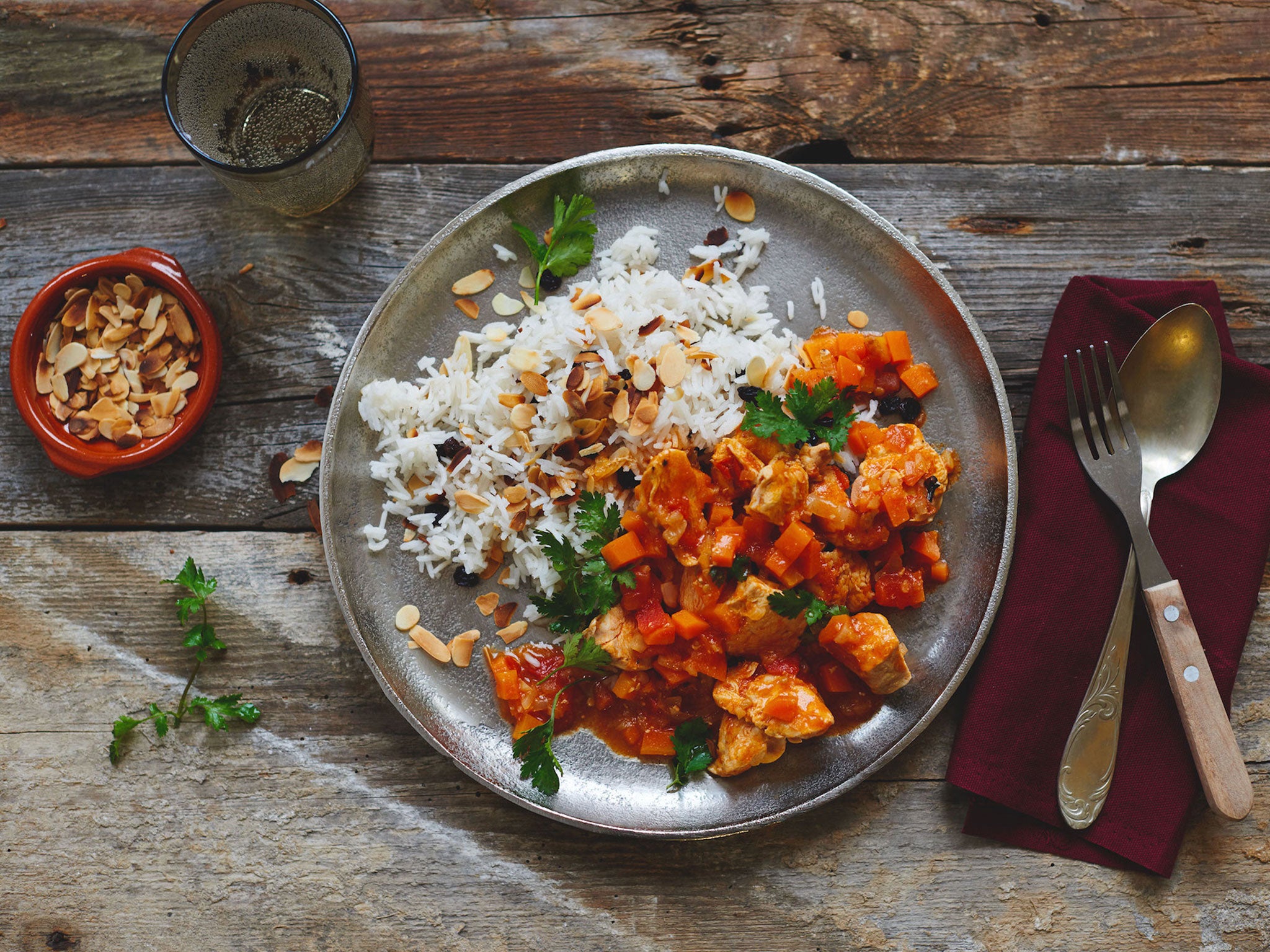 Arabic sweet spiced chicken with raisin and almond rice